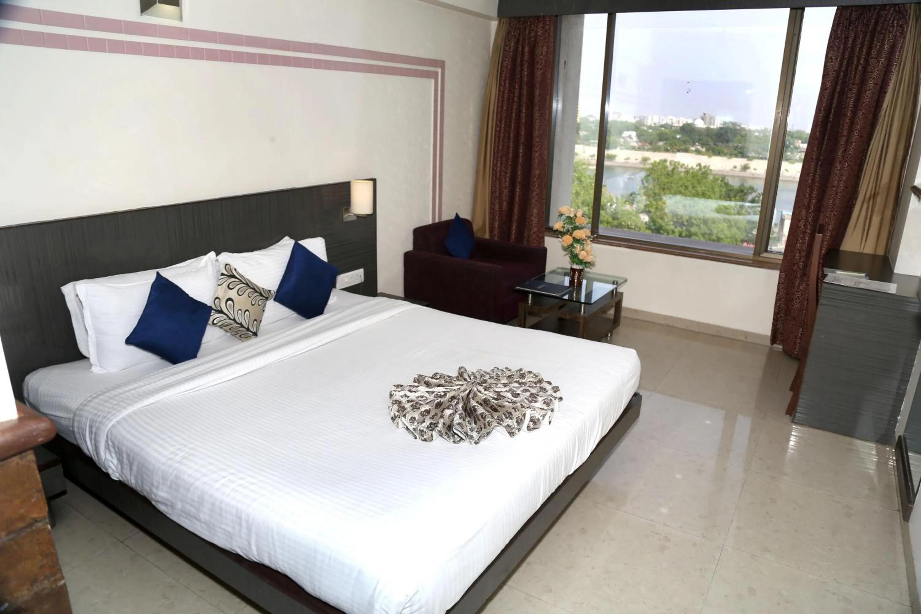 Bed in SilverCloud Hotel and Banquets