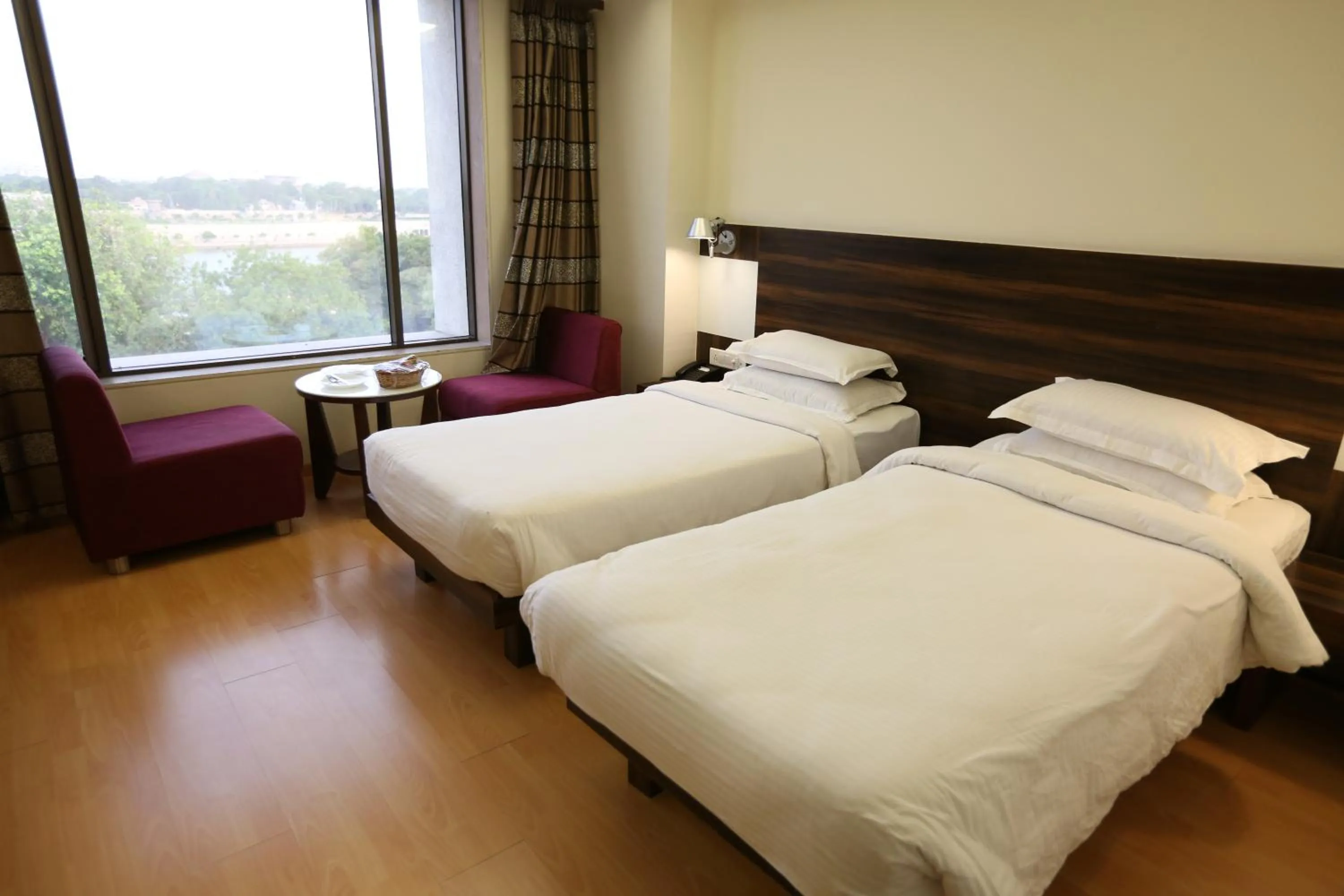 Bed in SilverCloud Hotel and Banquets