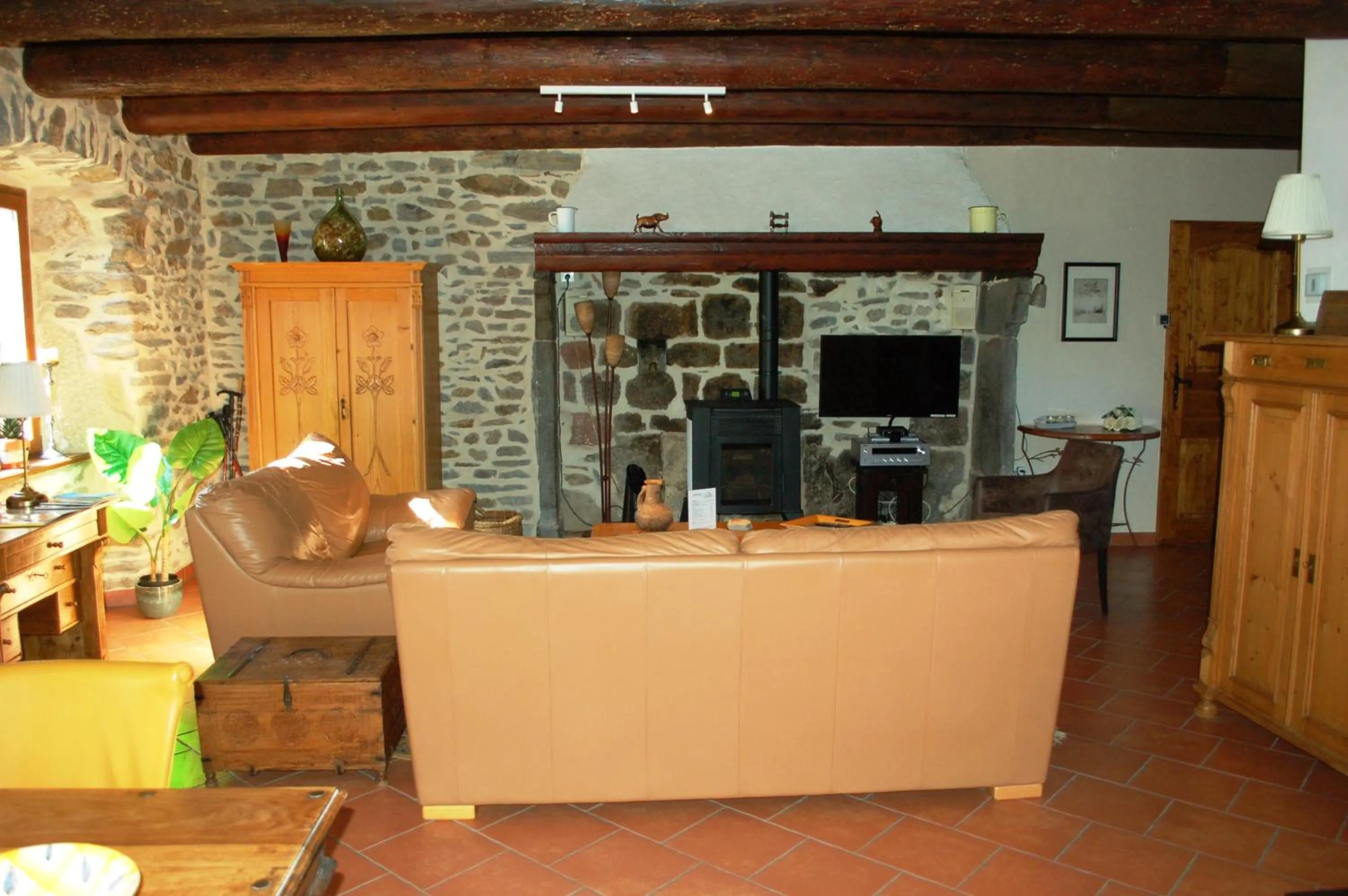Communal lounge/ TV room in Le Grand Trianon