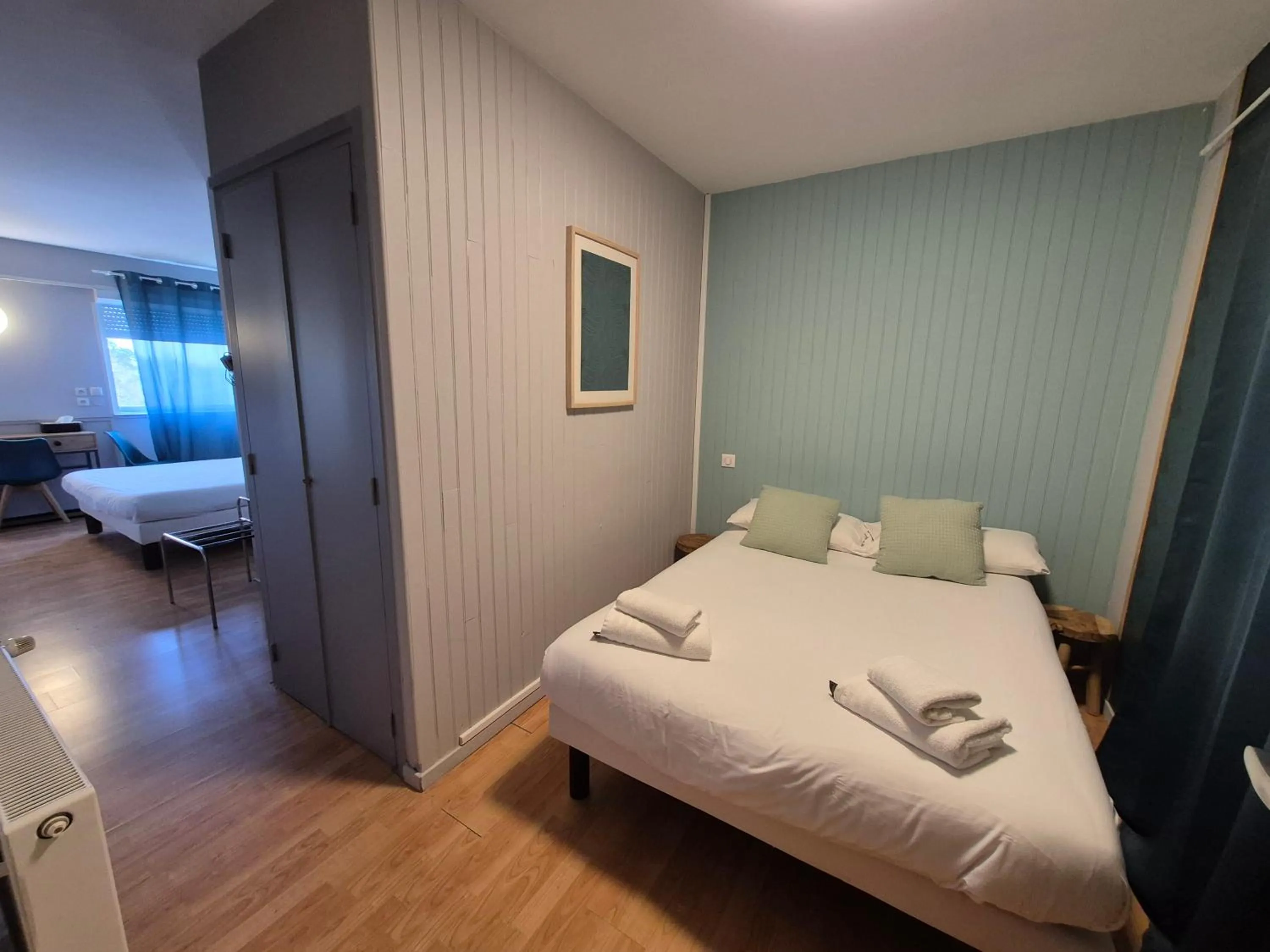 Bed in Logis Hotel Les Gravades Ussel