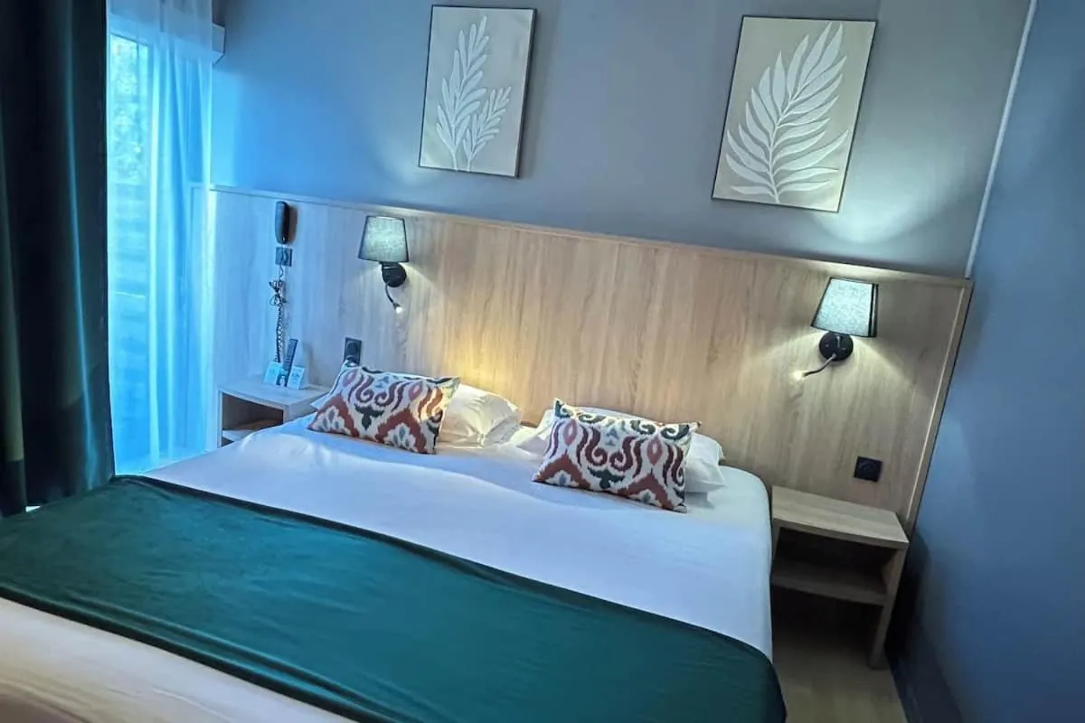 Double Room with Garden View - single occupancy in Logis Hotel Les Gravades Ussel