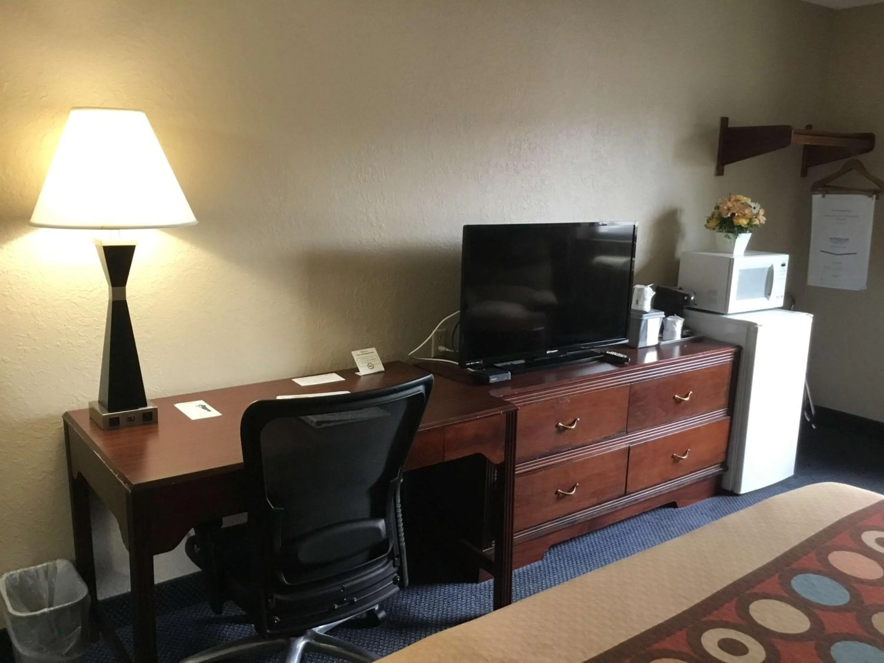 Photo of the whole room, TV/Entertainment Center in Super 8 by Wyndham Gardner