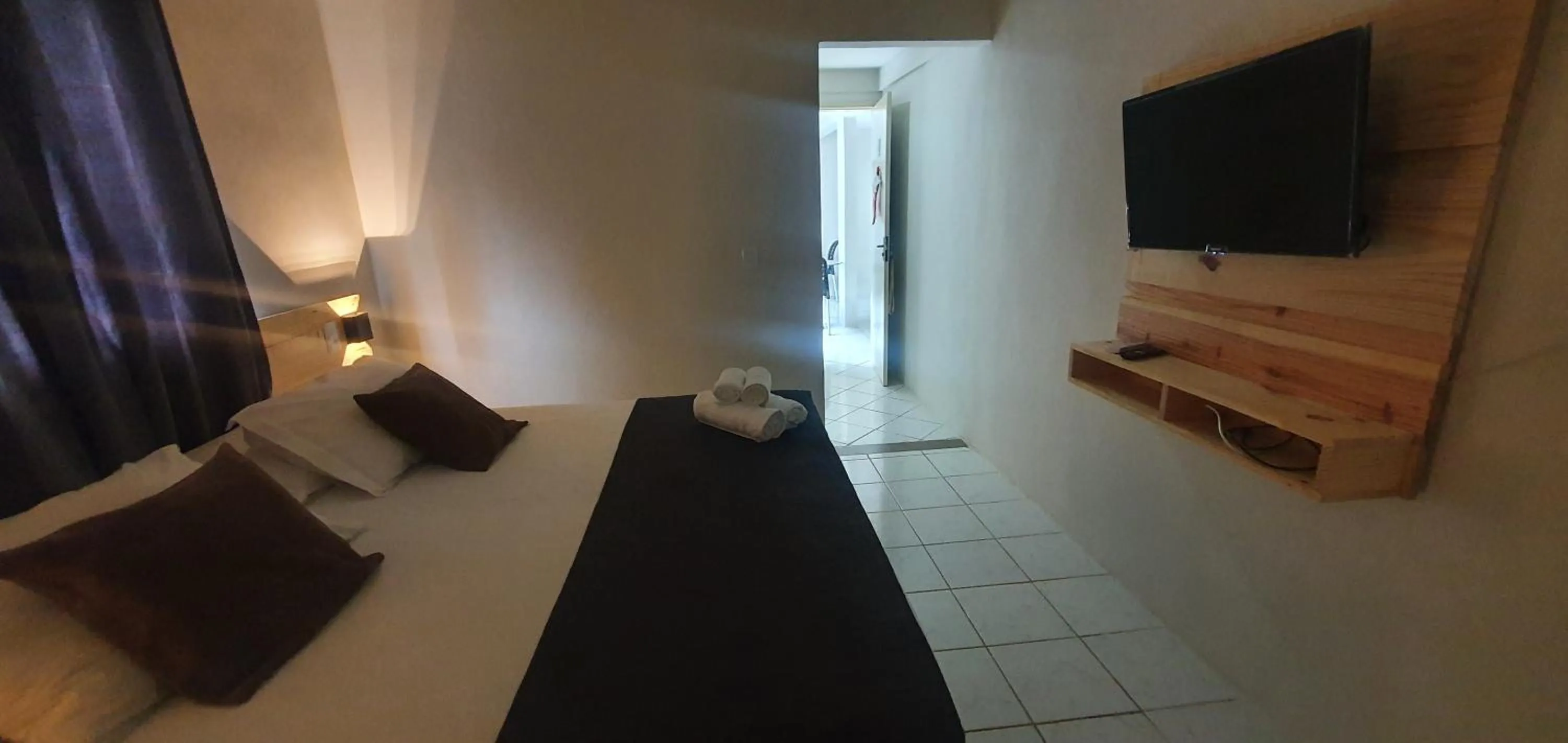 Bed in Pousada Aratu