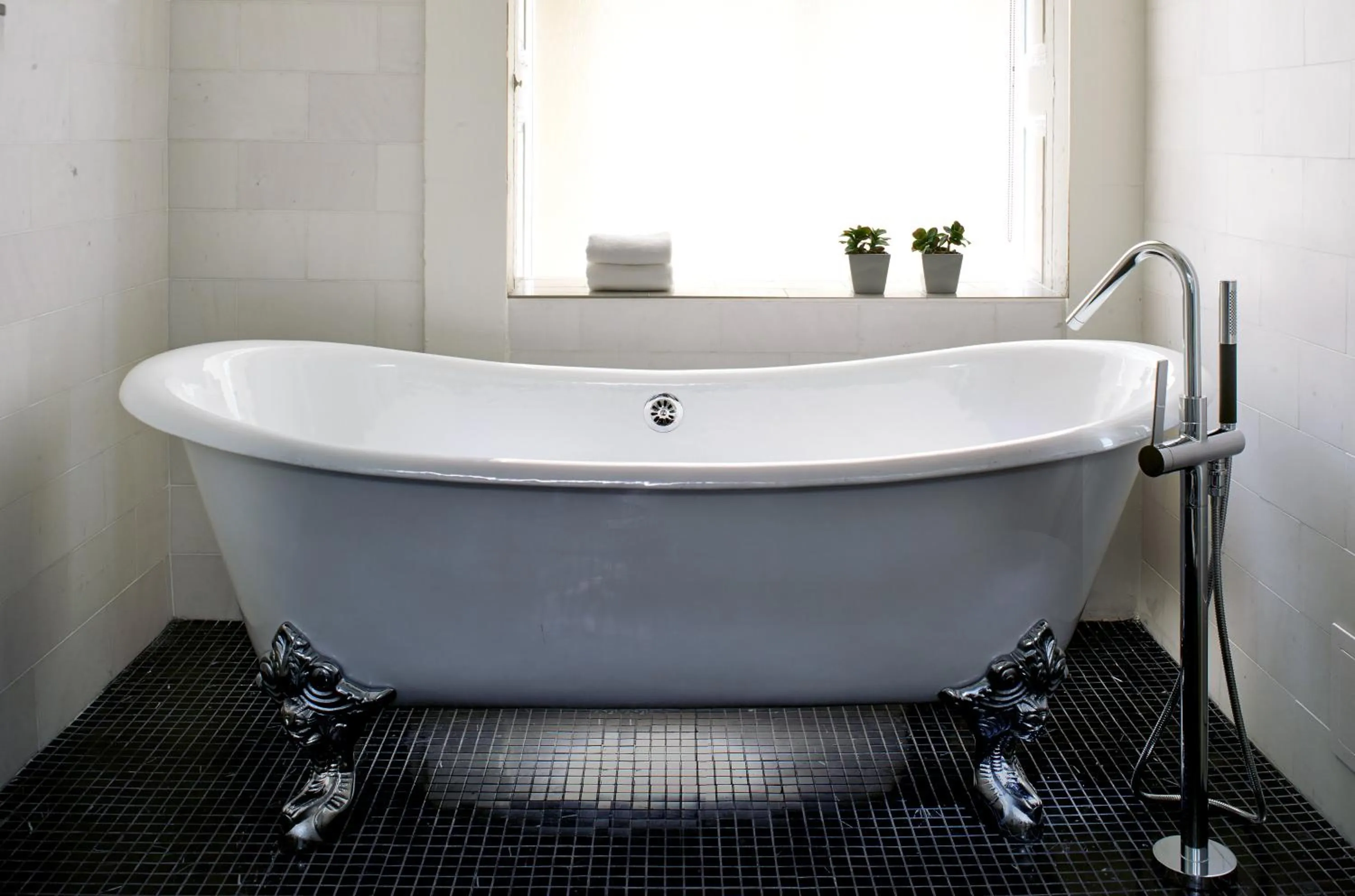 Bathroom in Kimpton Hotel Monaco Washington DC by IHG