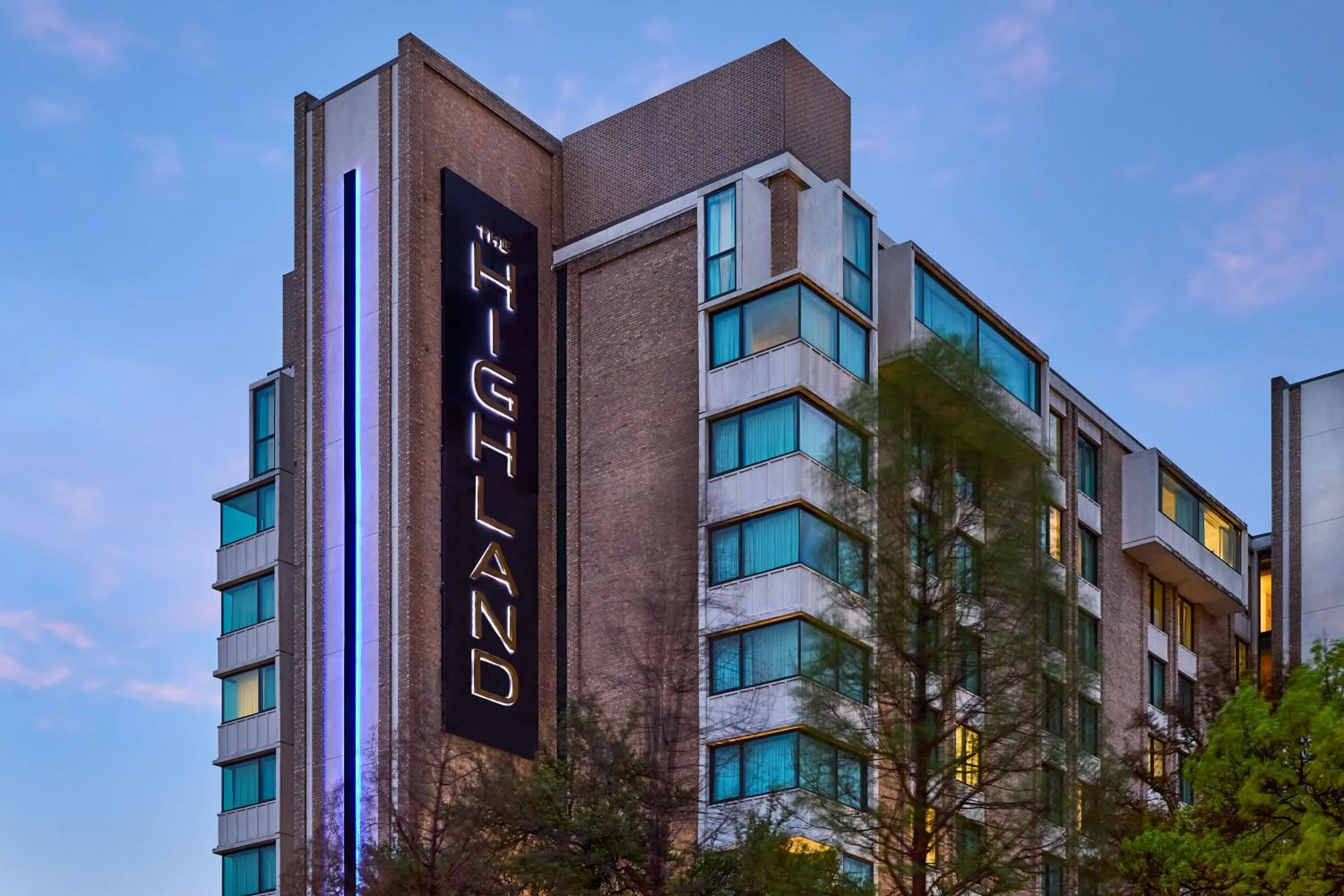 Property logo or sign in The Highland Dallas, Curio Collection by Hilton