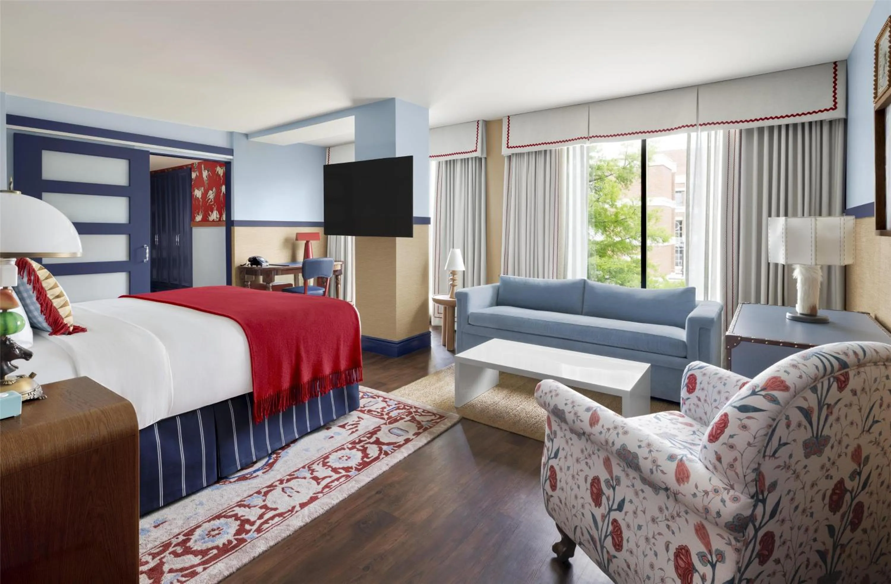 Living room, Bed in Graduate by Hilton Dallas