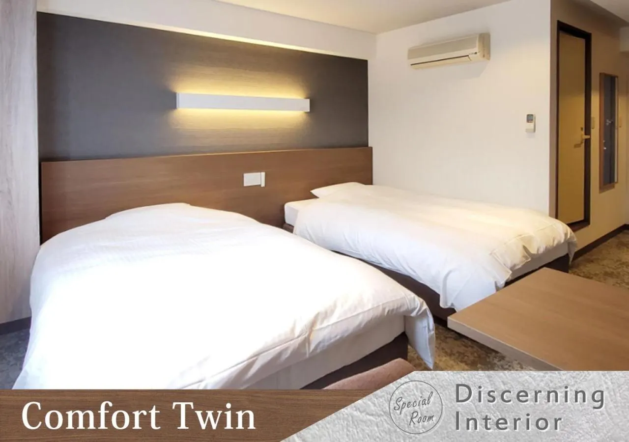 Bed in Forest Inn Gobo