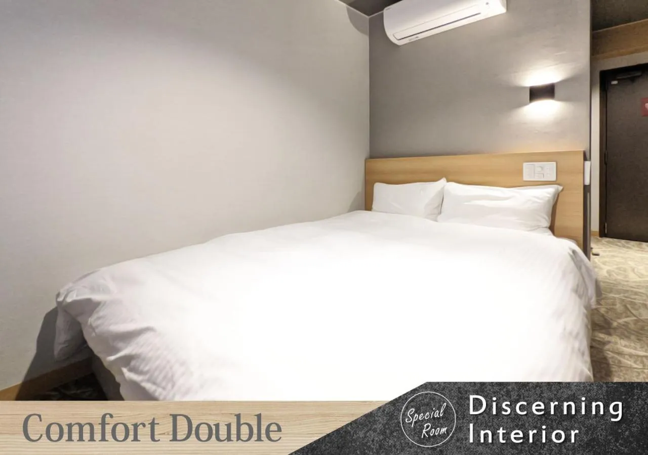 Bed in Forest Inn Gobo