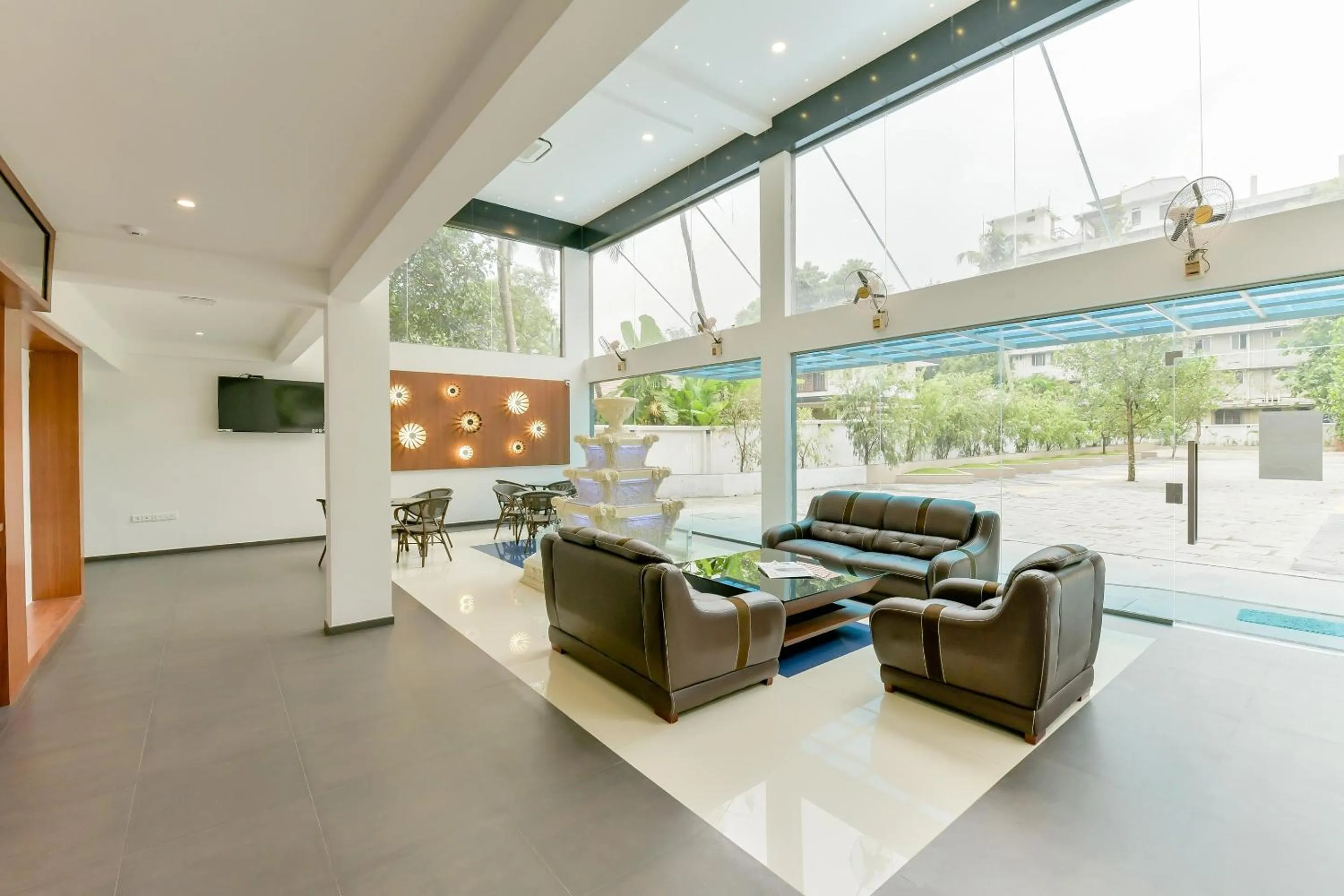 Lobby or reception in Super Townhouse Edassery Blue Bells