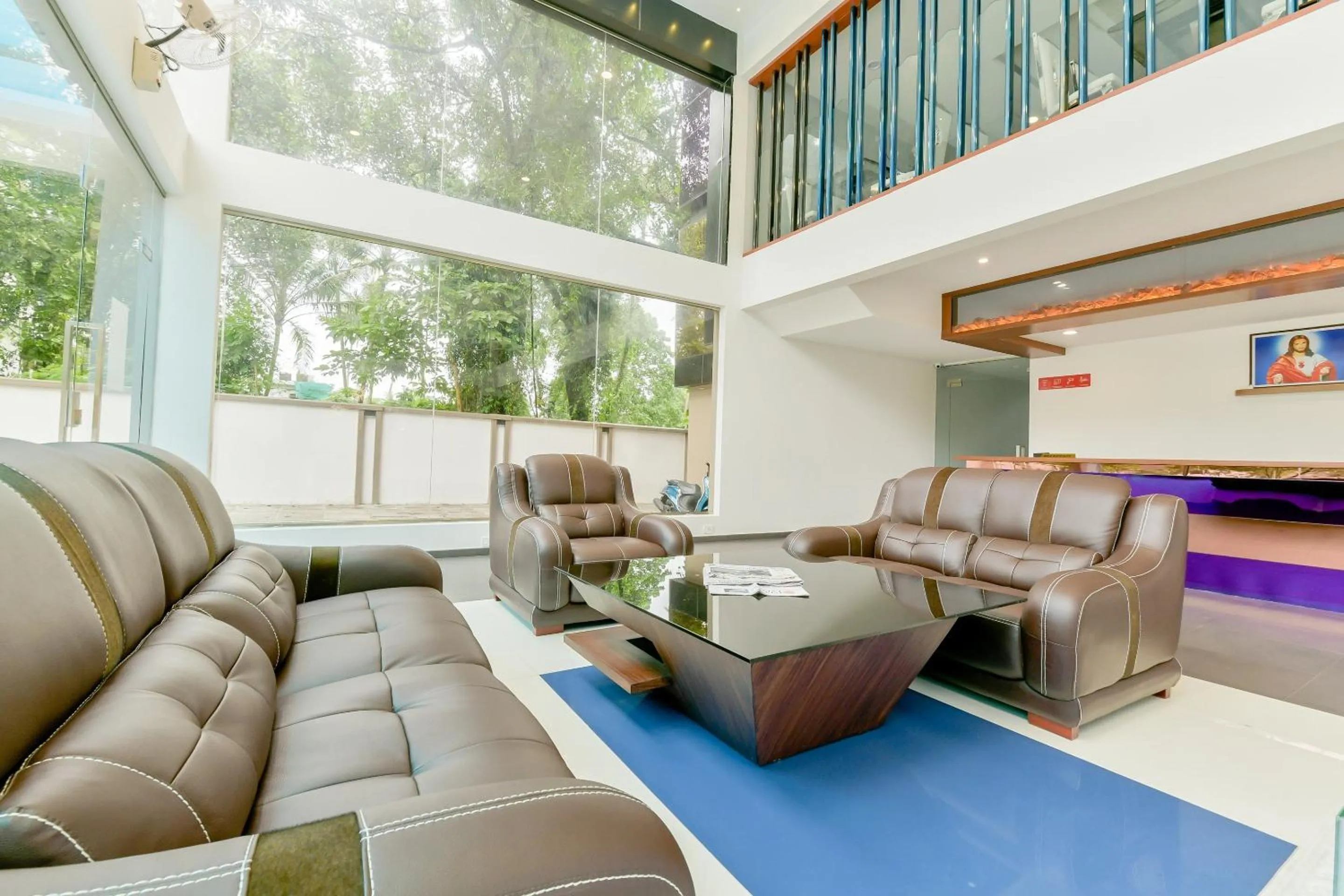 Lobby or reception in Super Townhouse Edassery Blue Bells