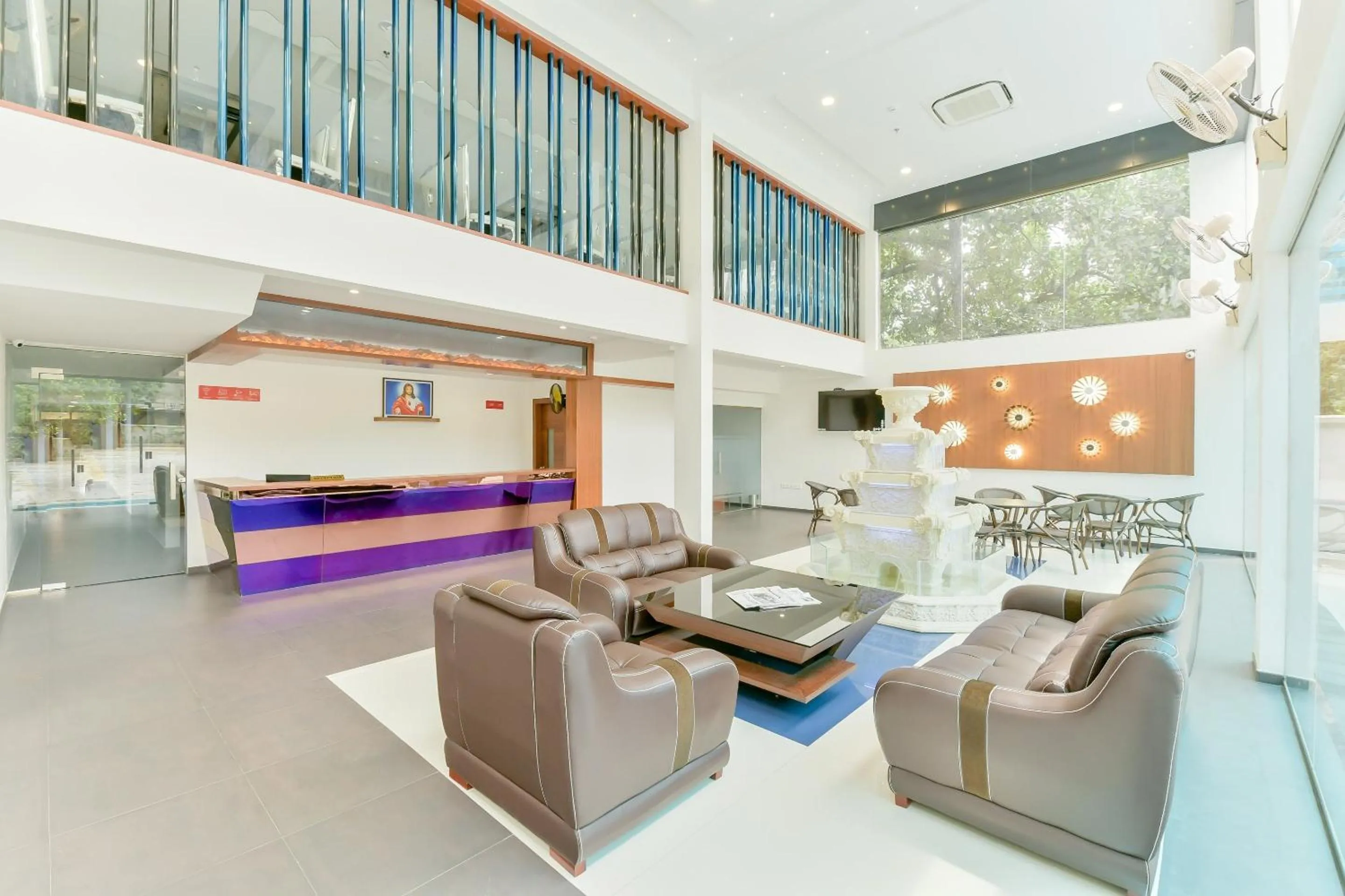 Lobby or reception in Super Townhouse Edassery Blue Bells