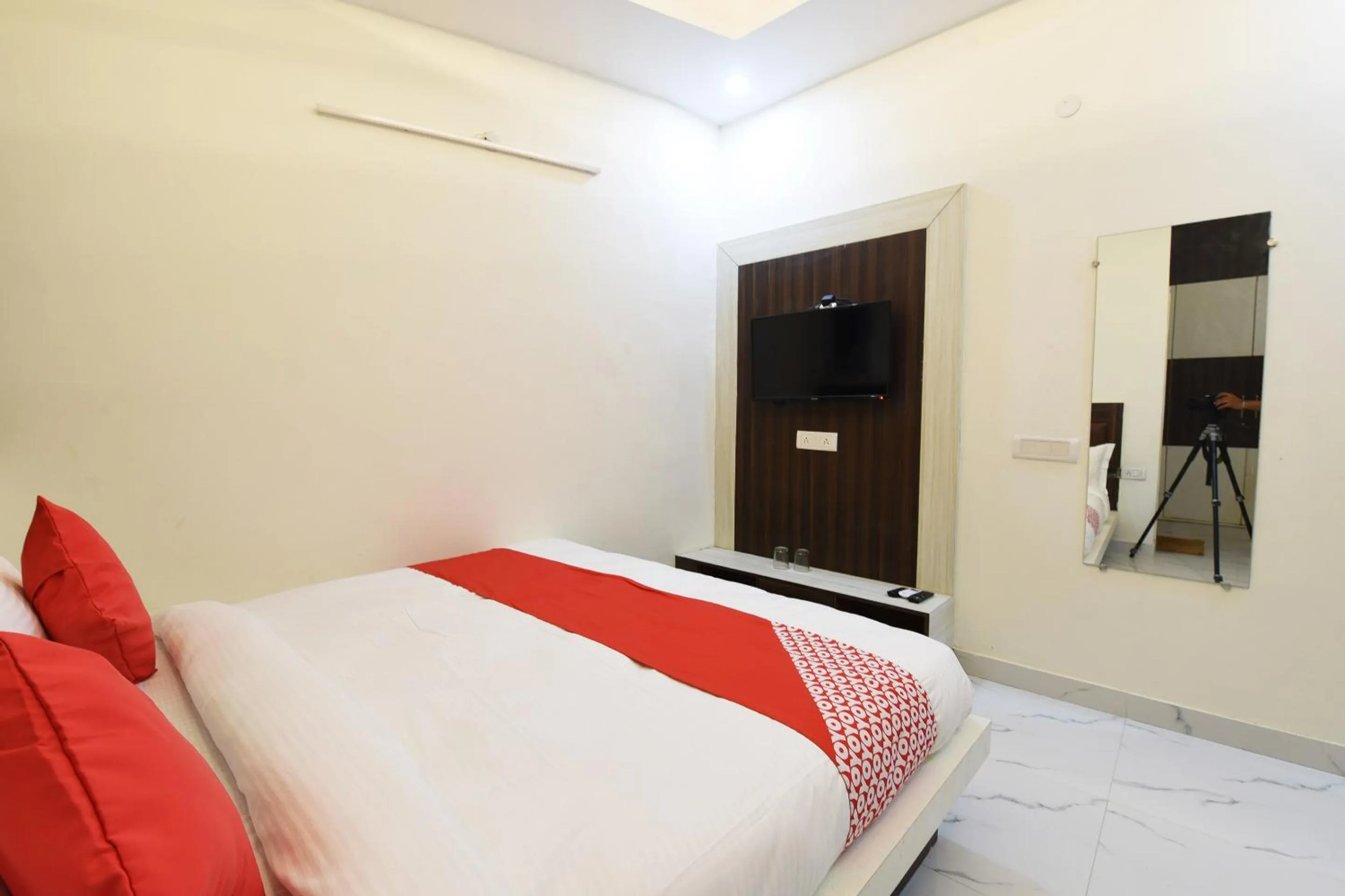 Bedroom in Hotel O The Signature Hotel Near Iskcon Temple Noida