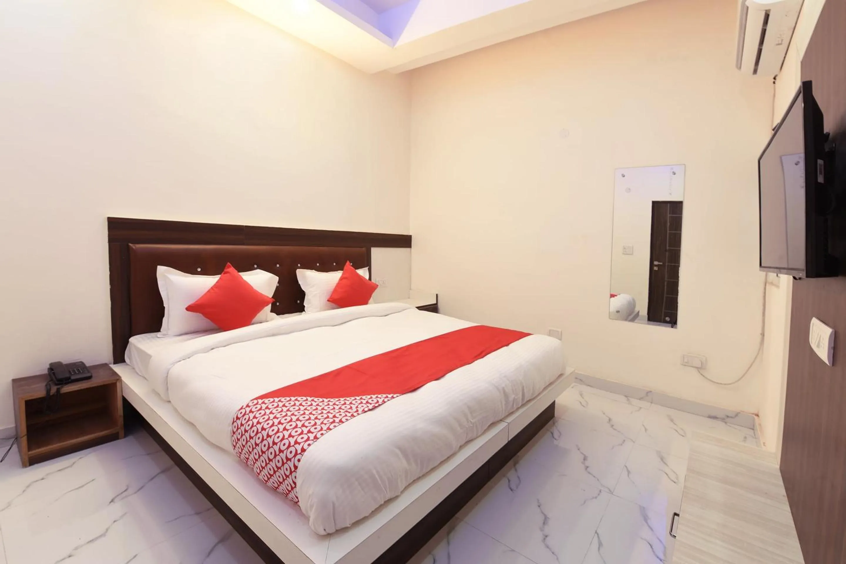 Bedroom in Hotel O The Signature Hotel Near Iskcon Temple Noida