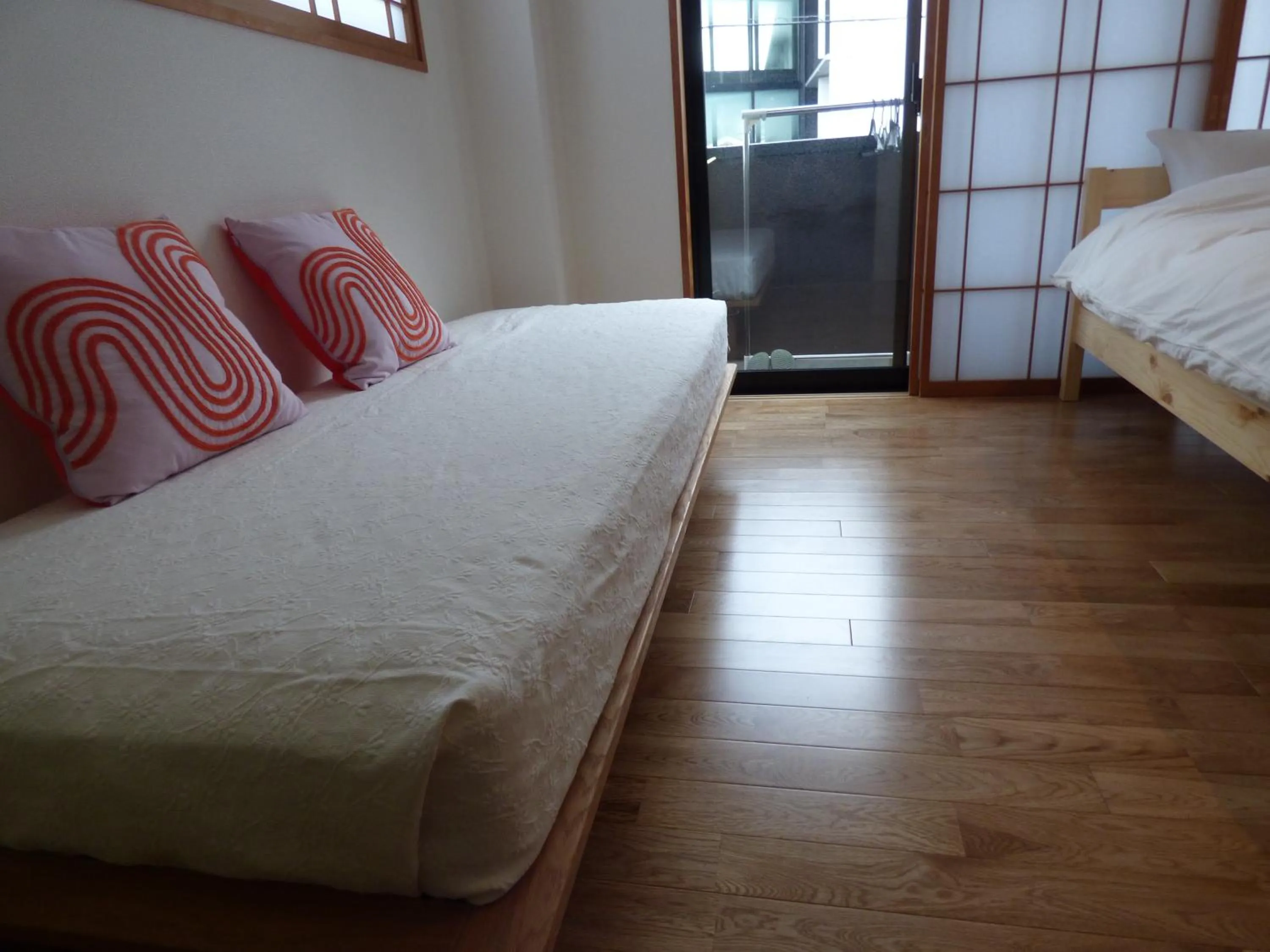 Bed in Guesthouse Hyakumanben Cross