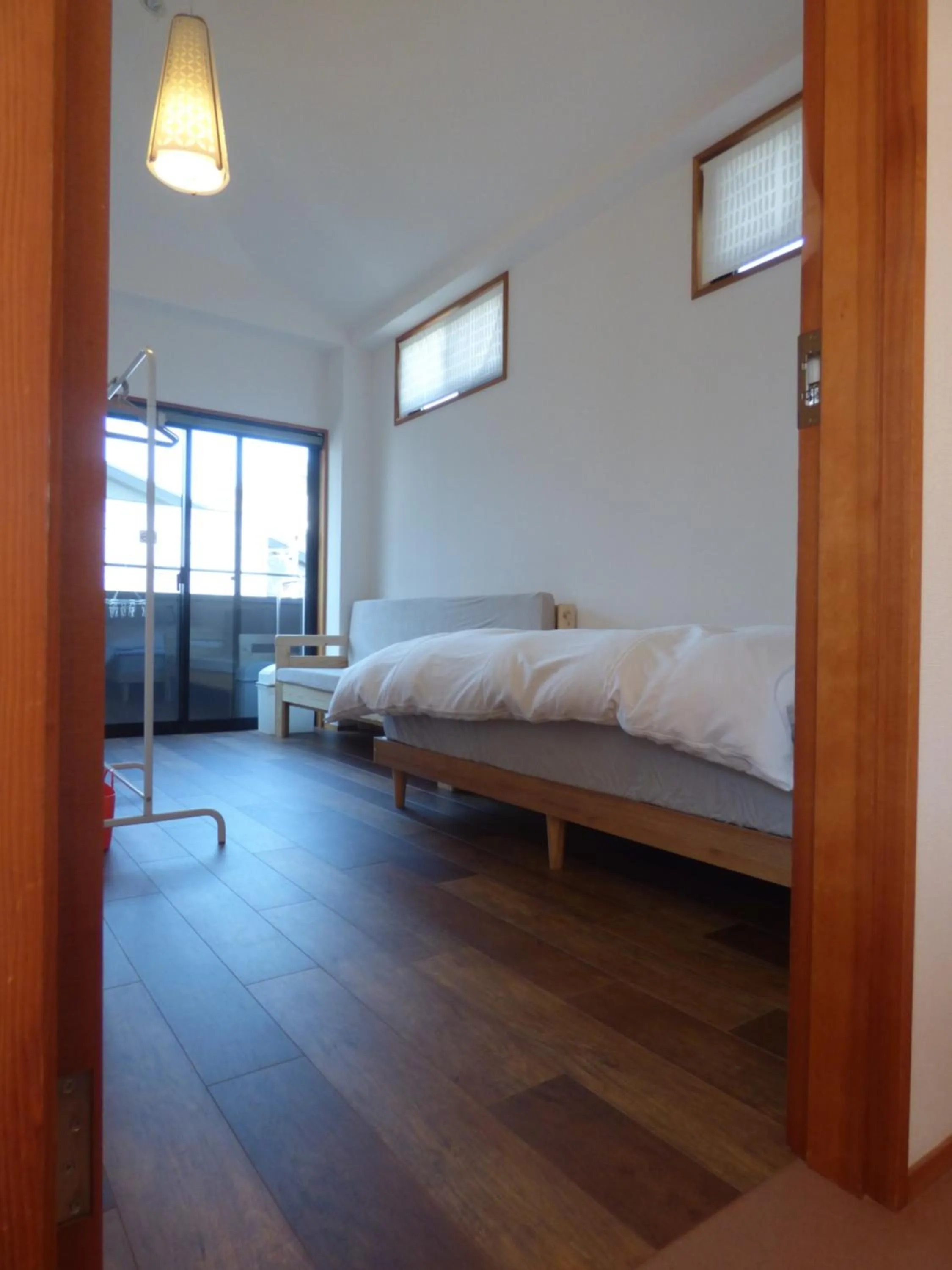 Bed in Guesthouse Hyakumanben Cross