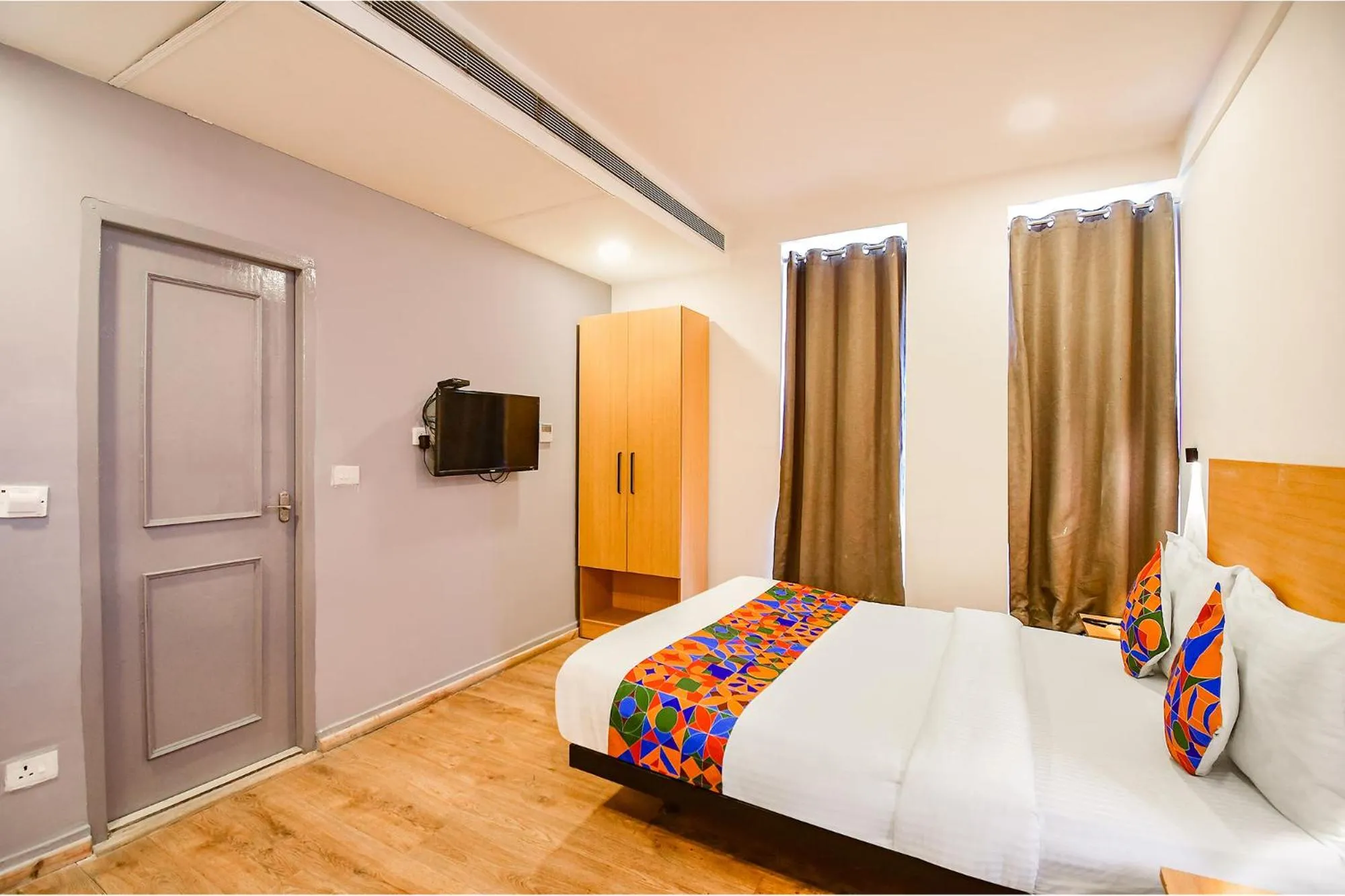 Bed in FabHotel Airport Green Arcade - near Kolkata Airport