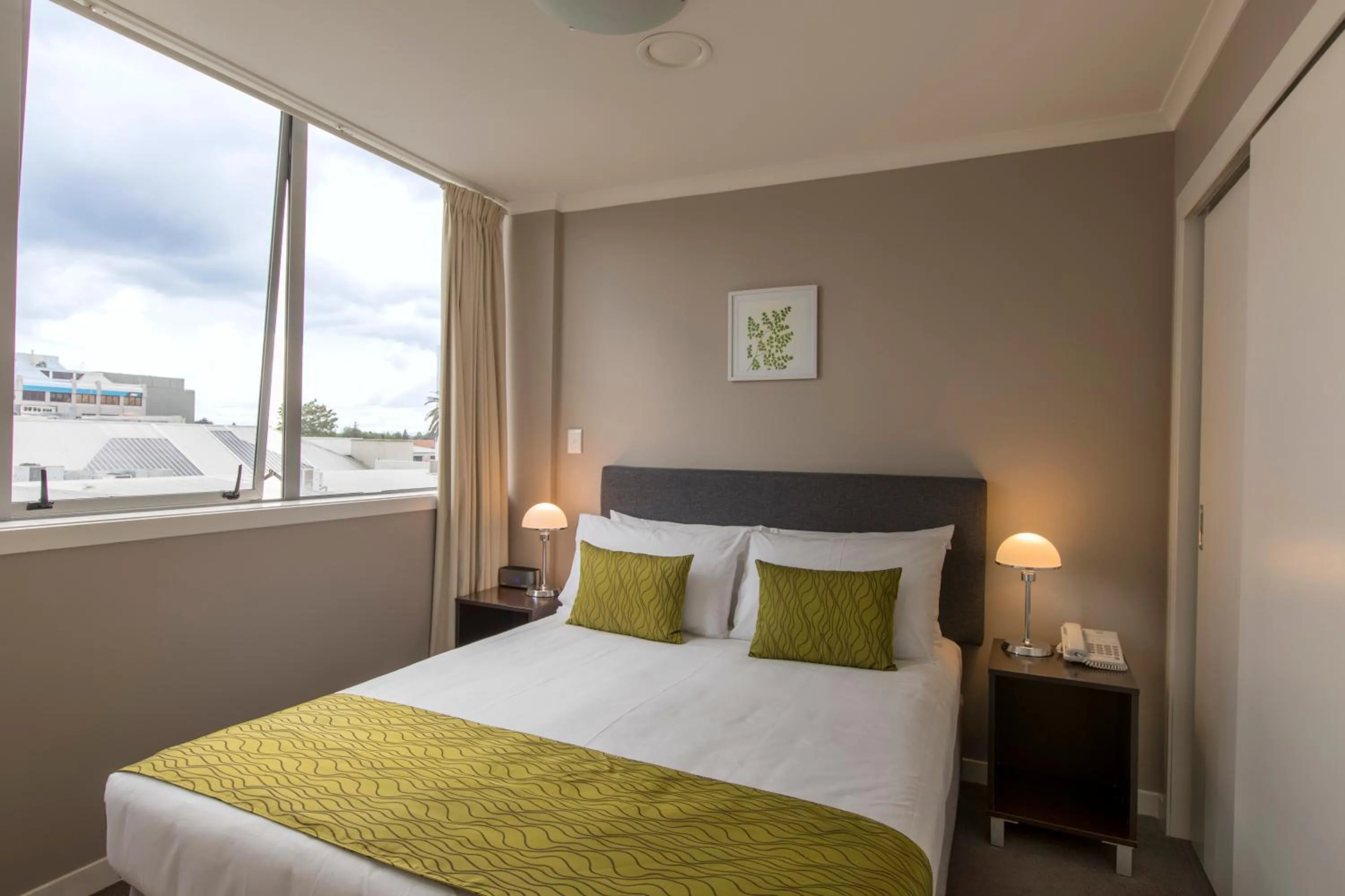 Bed in Quest On Ward Serviced Apartments