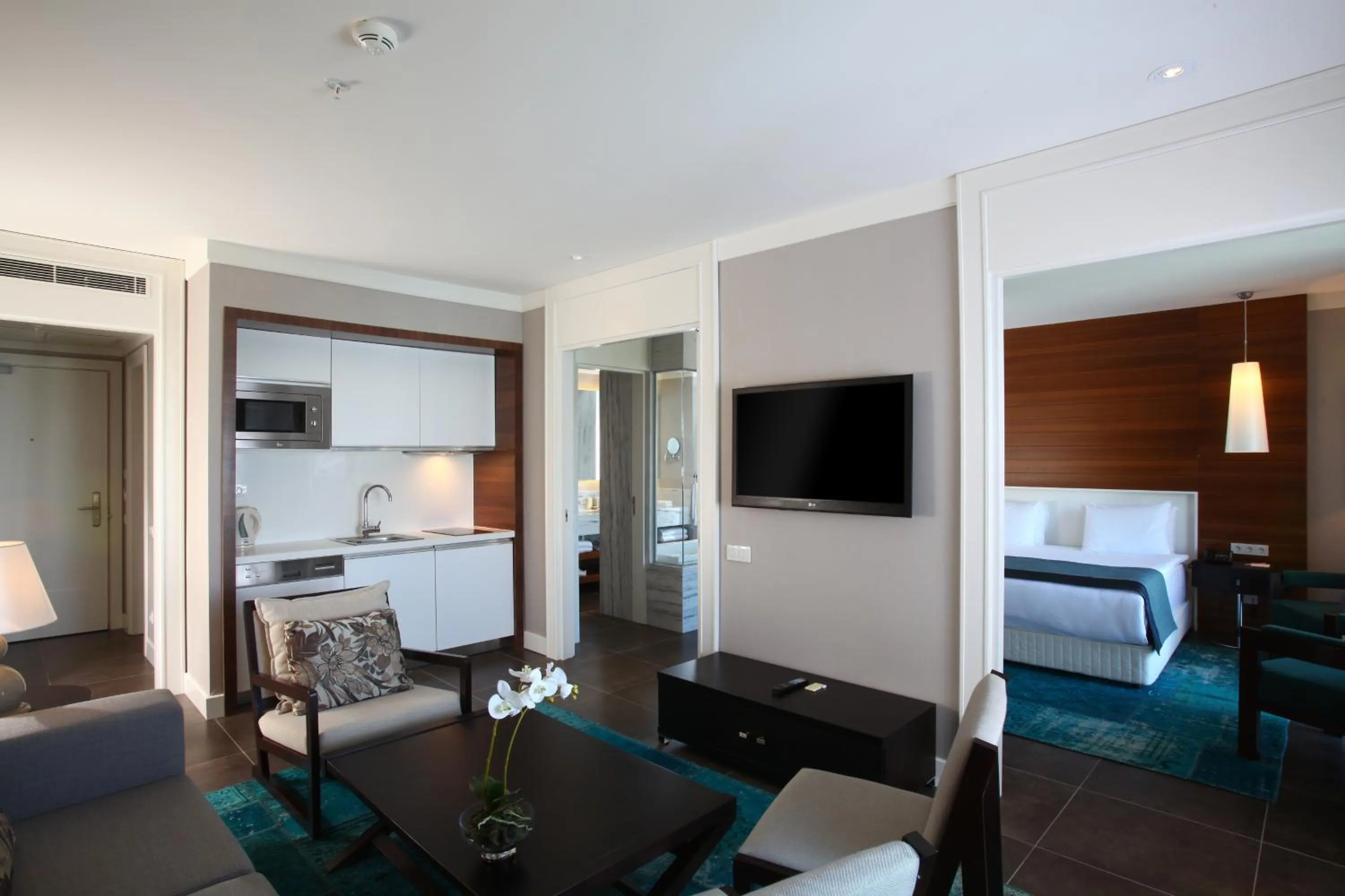 Bed in Sundance Suites Hotel