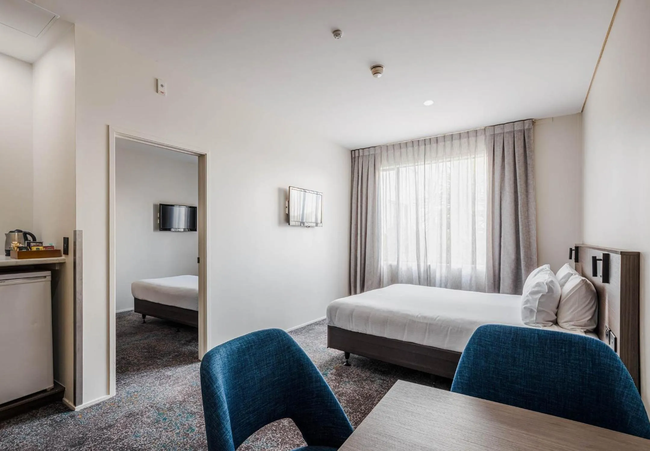 Bed in Heartland Hotel Auckland Airport