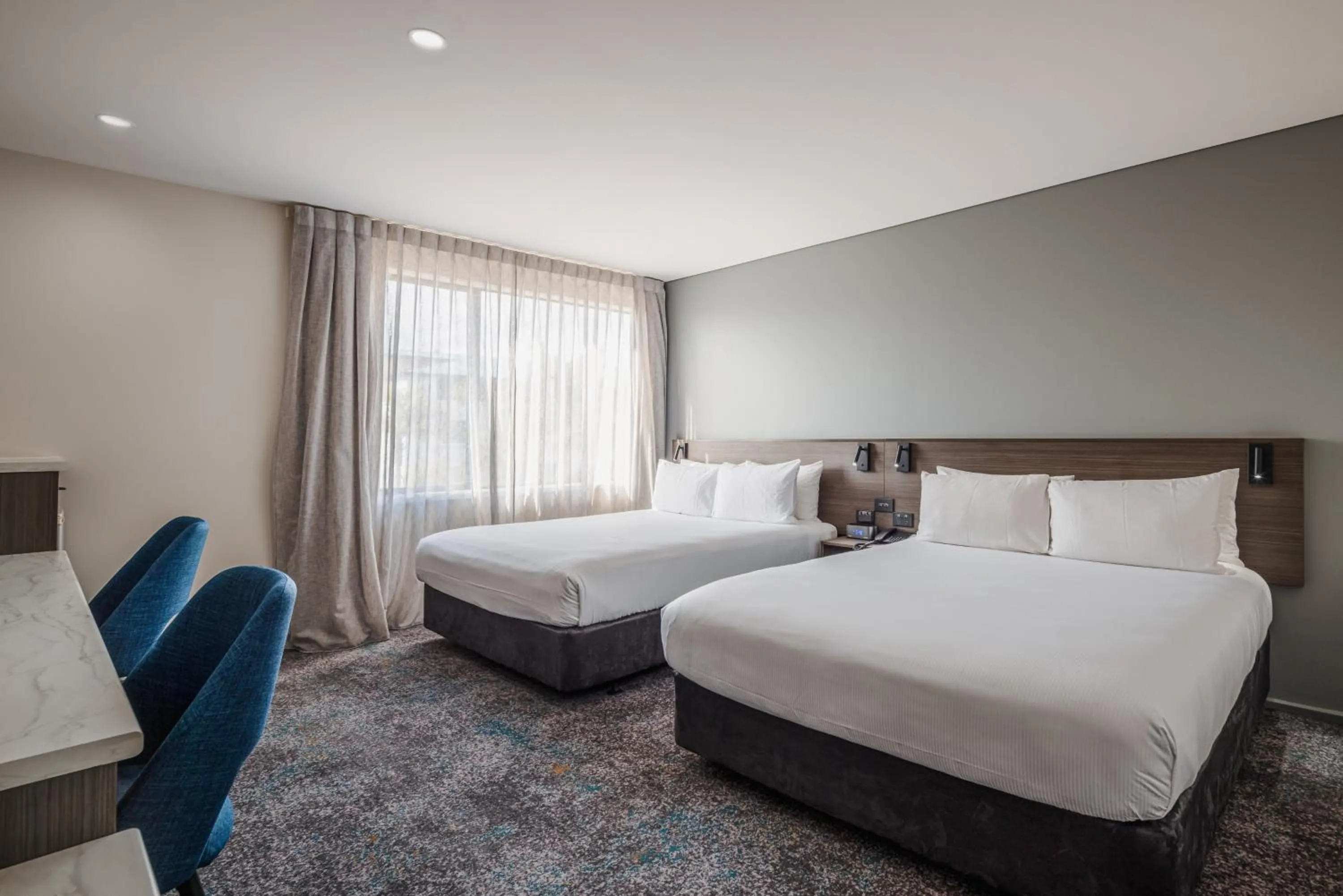 Photo of the whole room, Bed in Heartland Hotel Auckland Airport