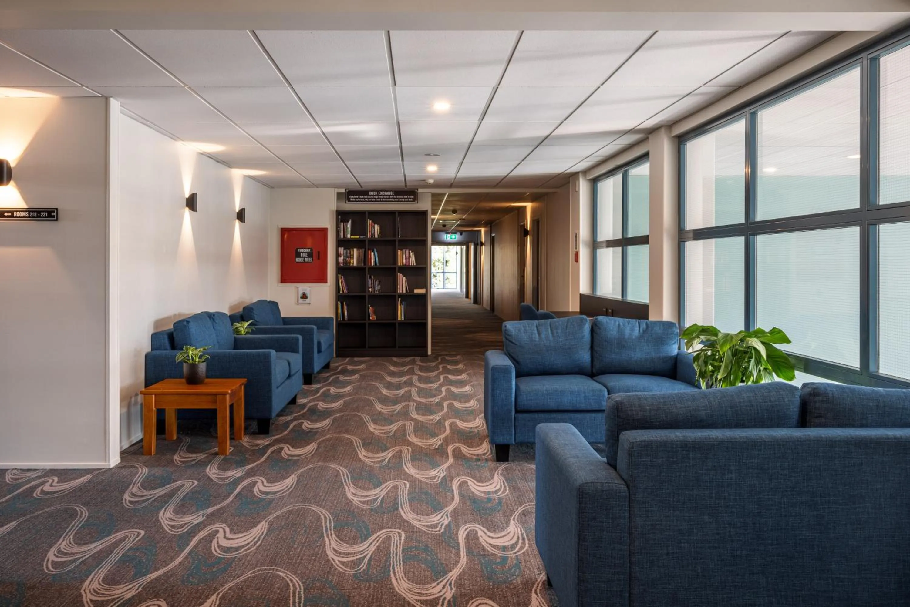 Communal lounge/ TV room in Heartland Hotel Auckland Airport