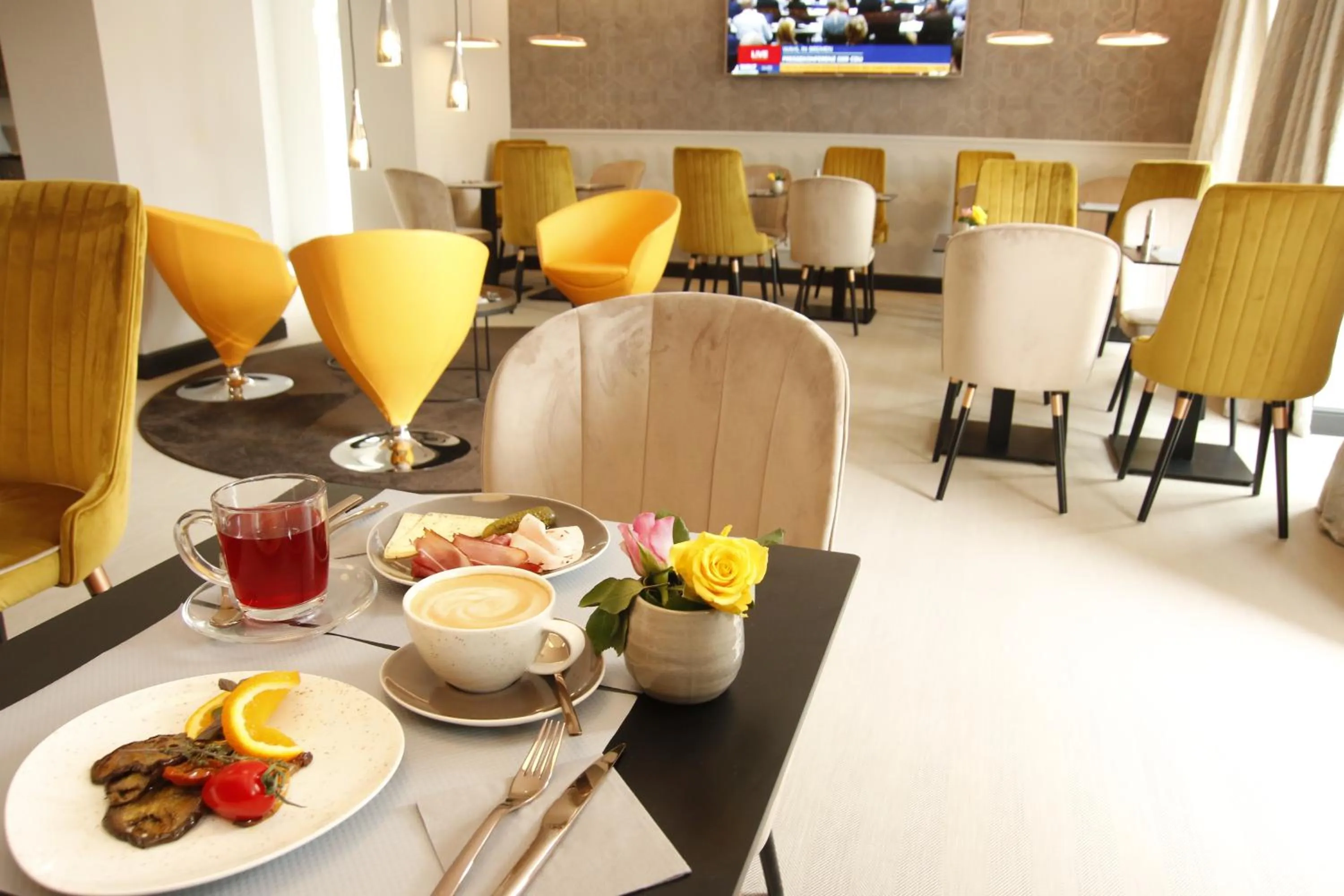 Food and drinks in Amelie No 1 Hotel & Appartements
