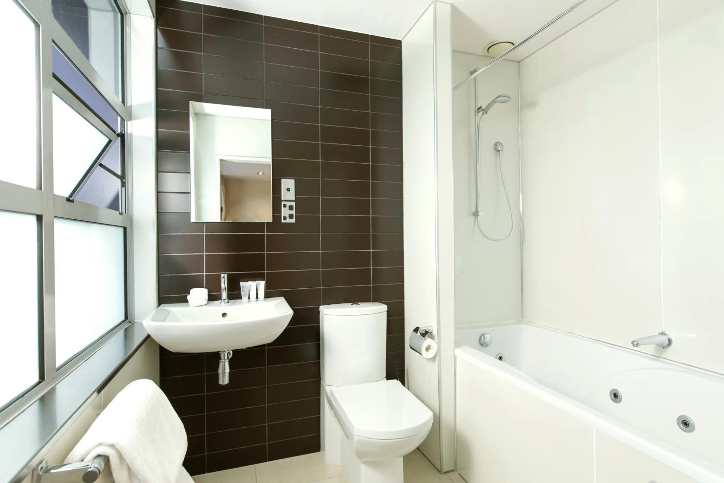 Bathroom in Quest Newmarket Serviced Apartments