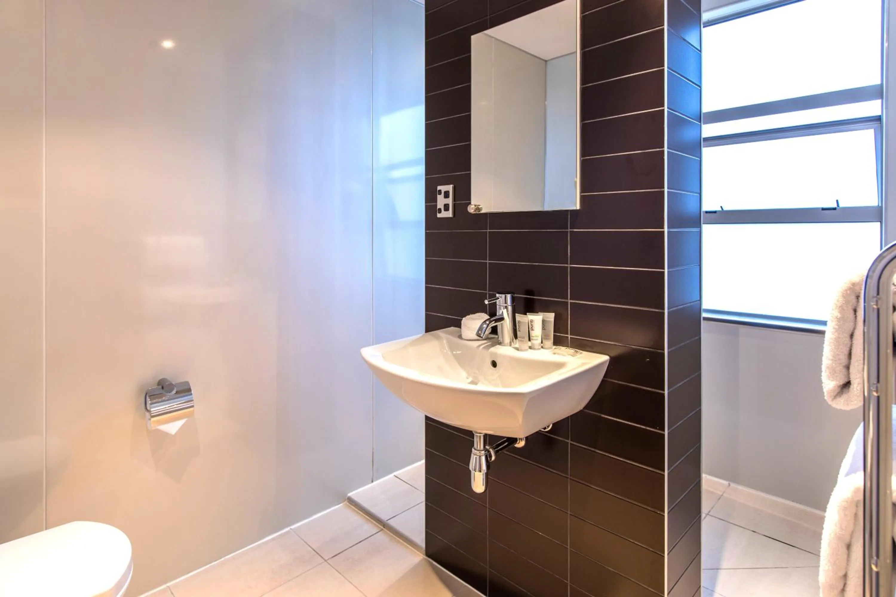 Bathroom in Quest Newmarket Serviced Apartments