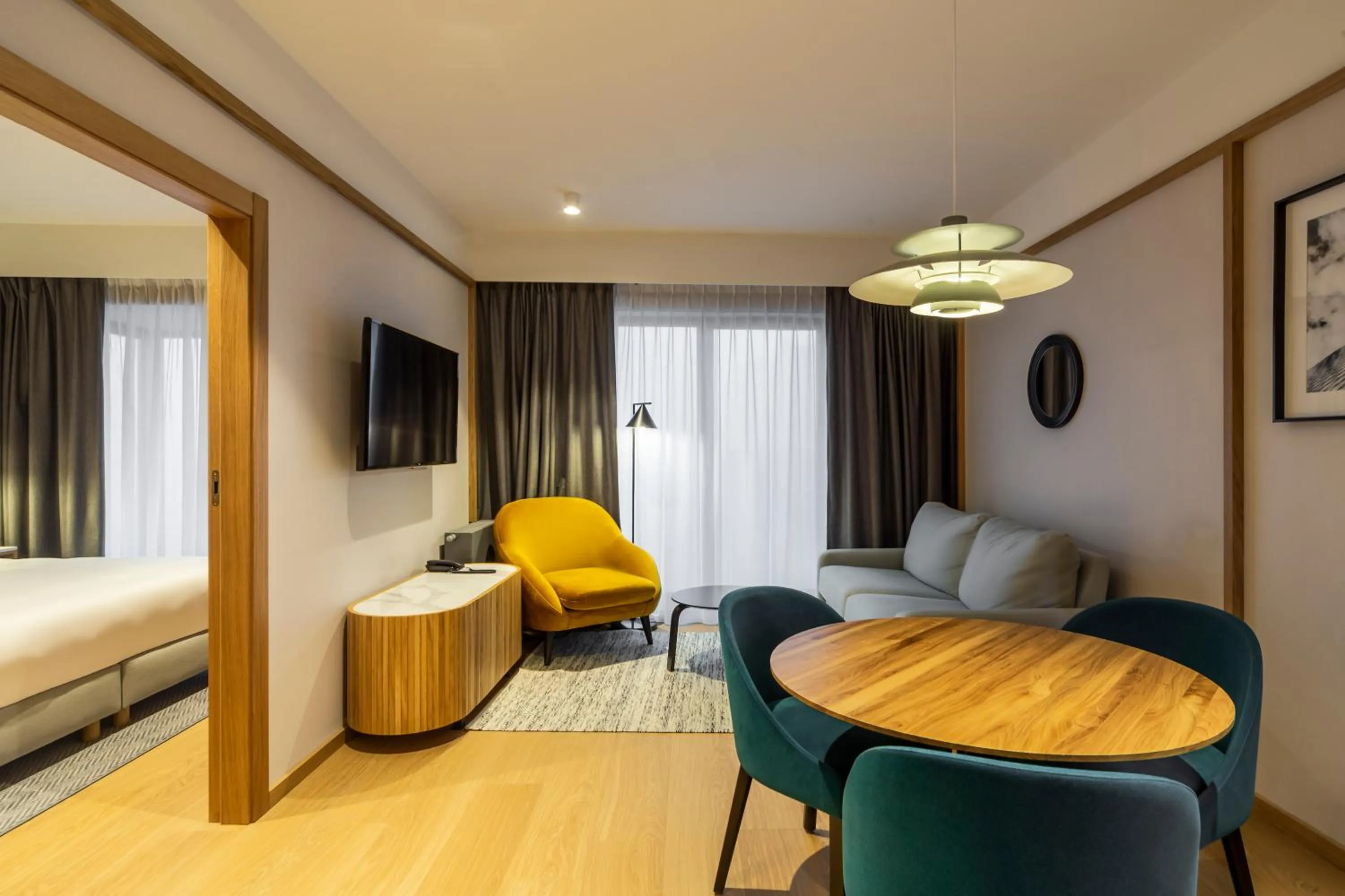 Living room, Bed in Radisson Hotel & Apartments Gdansk