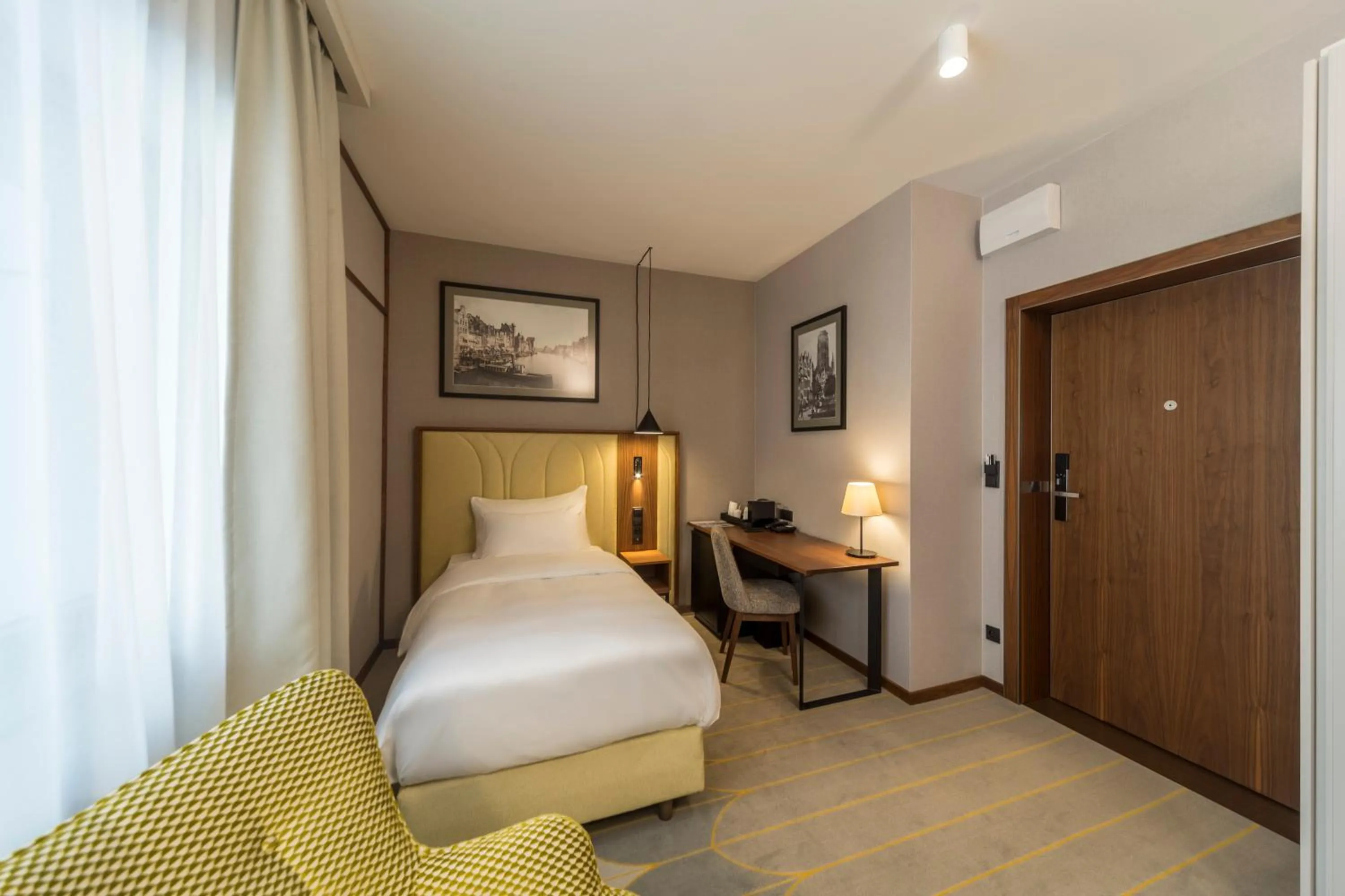 Bed in Radisson Hotel & Apartments Gdansk