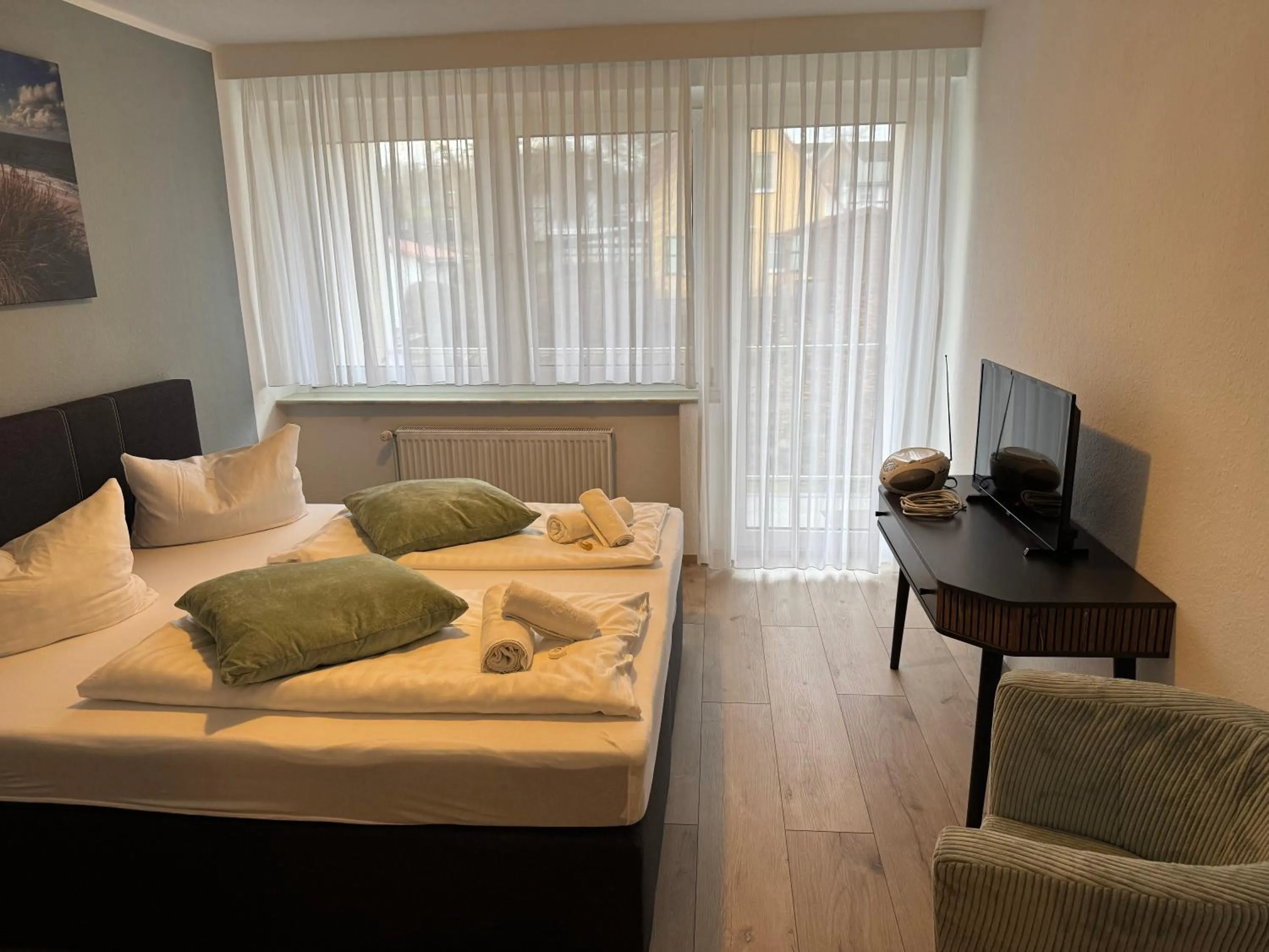 Photo of the whole room, Bed in Alcor Hotel Feriendorf an der Ostsee