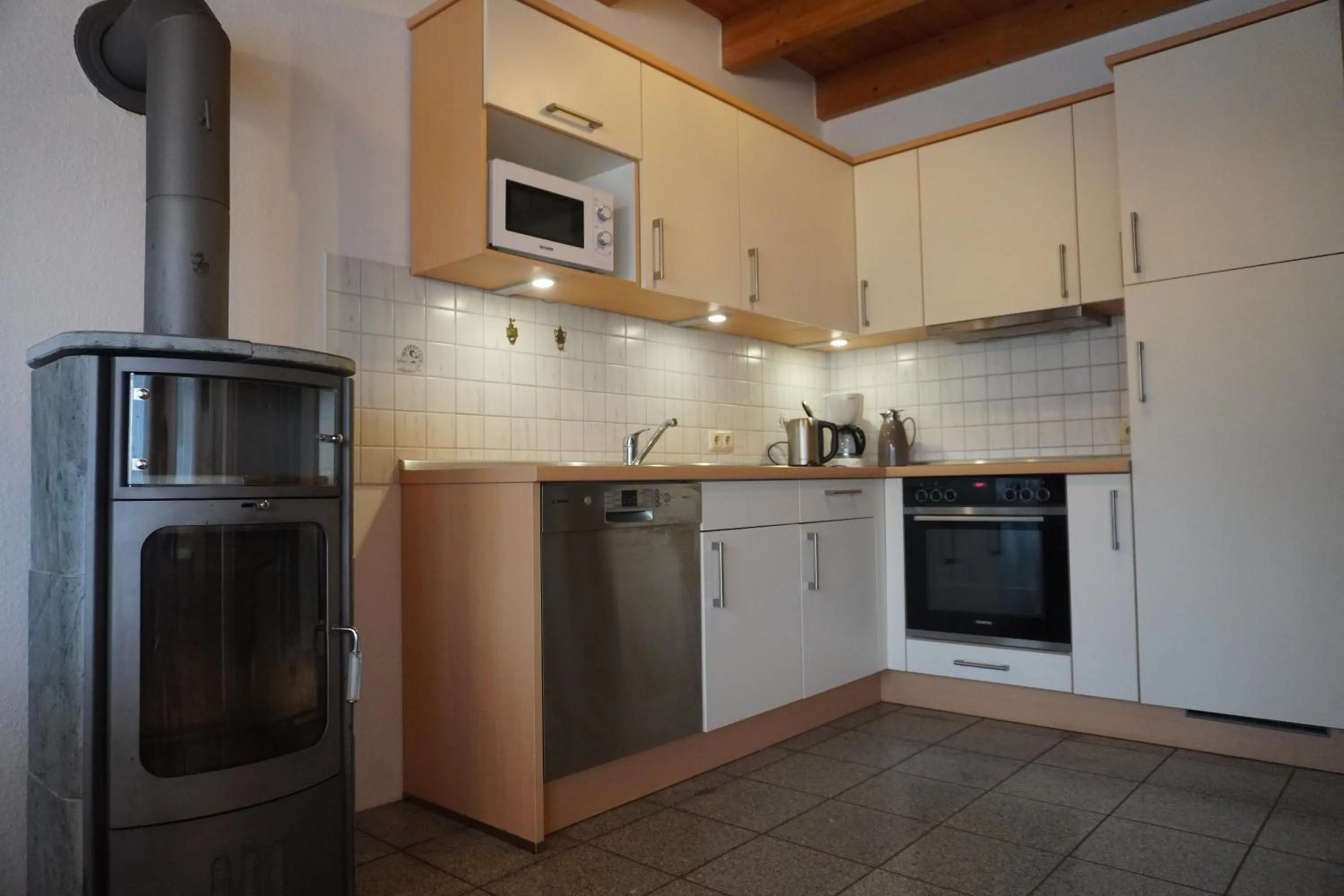 Kitchen or kitchenette in Alcor Hotel Feriendorf an der Ostsee