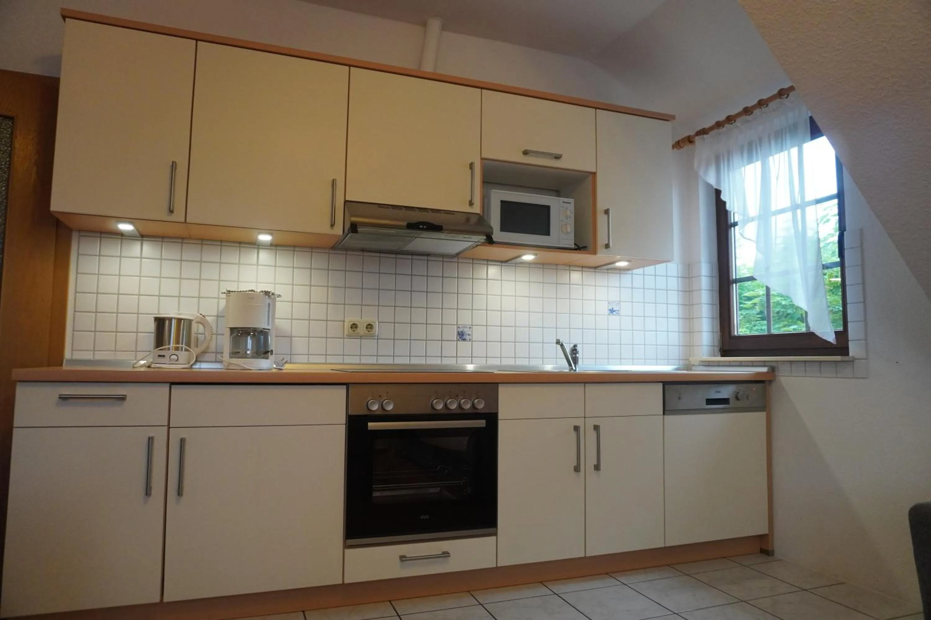 Kitchen or kitchenette in Alcor Hotel Feriendorf an der Ostsee