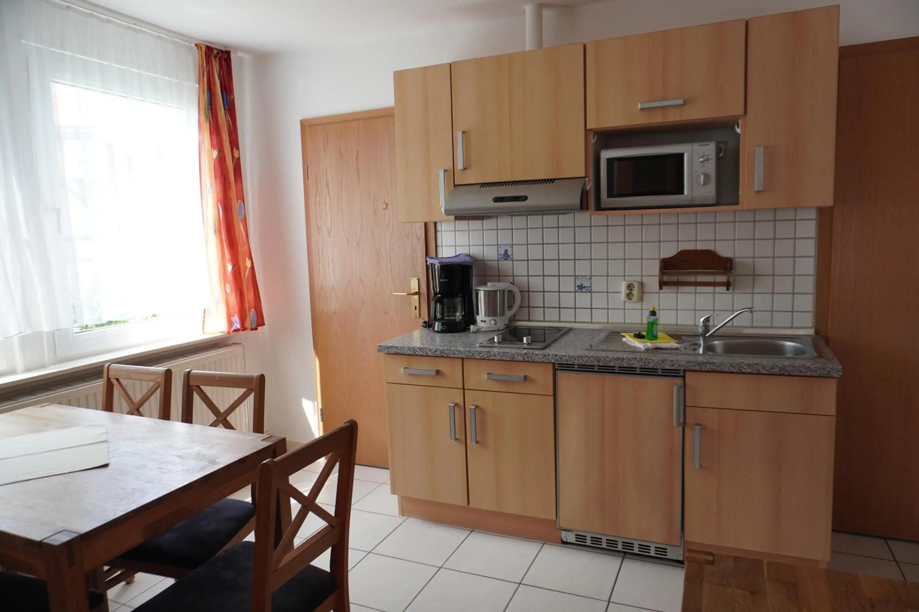 Kitchen or kitchenette in Alcor Hotel Feriendorf an der Ostsee