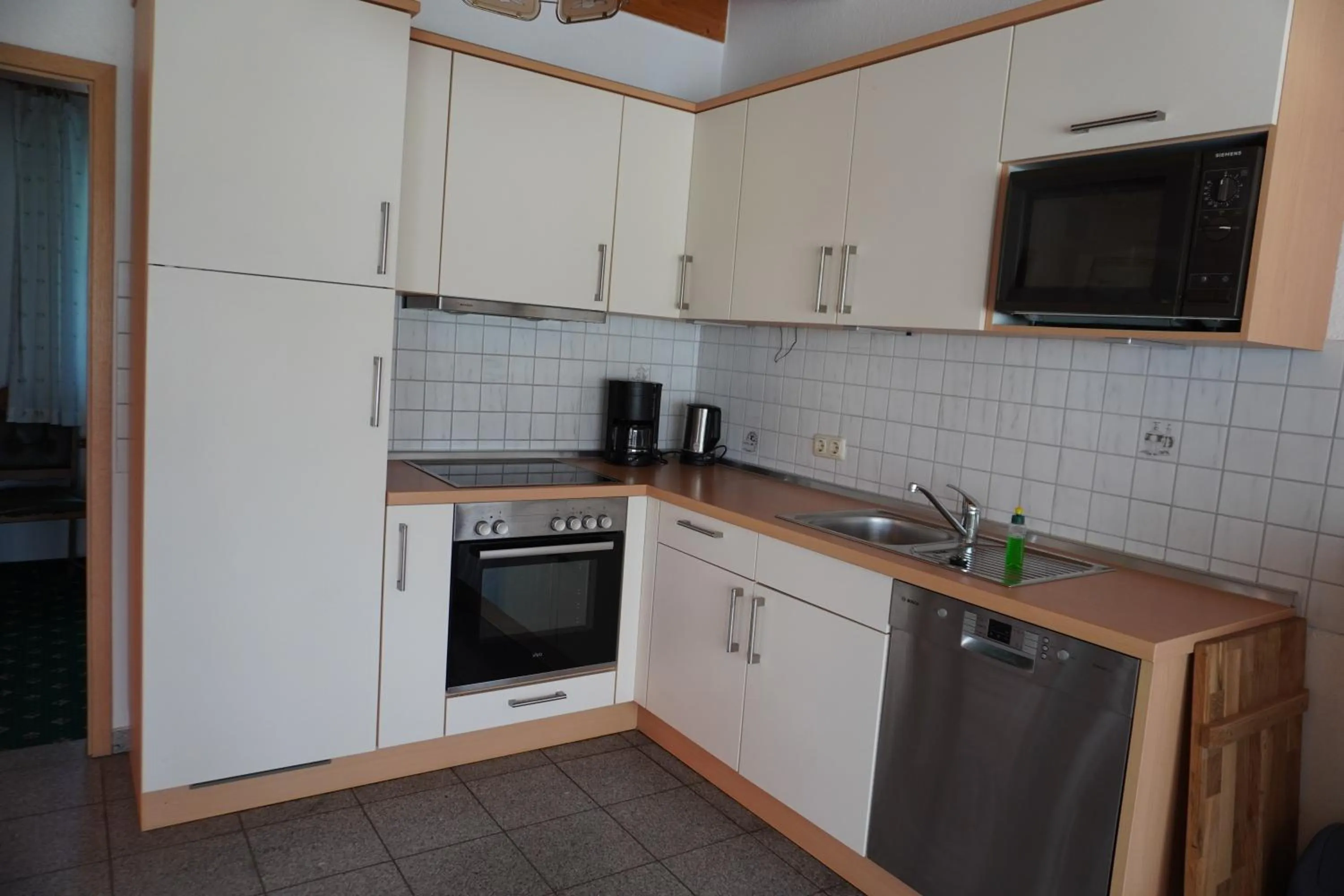 Kitchen or kitchenette in Alcor Hotel Feriendorf an der Ostsee