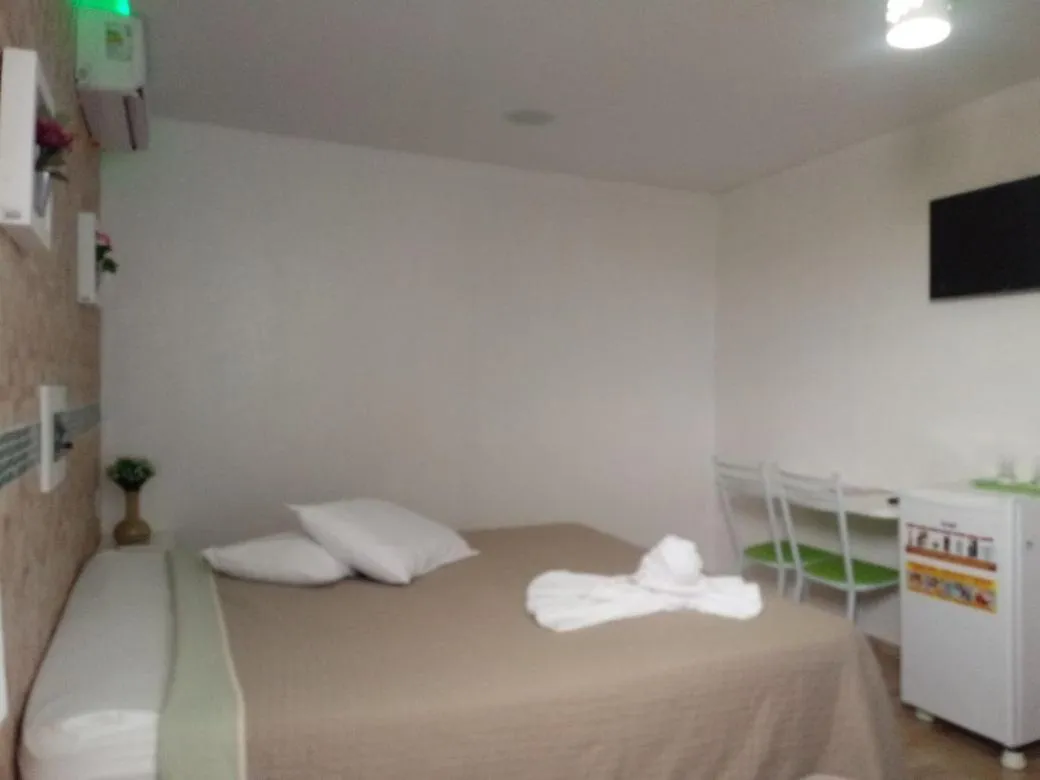 Bed in Hotel Cajuína City