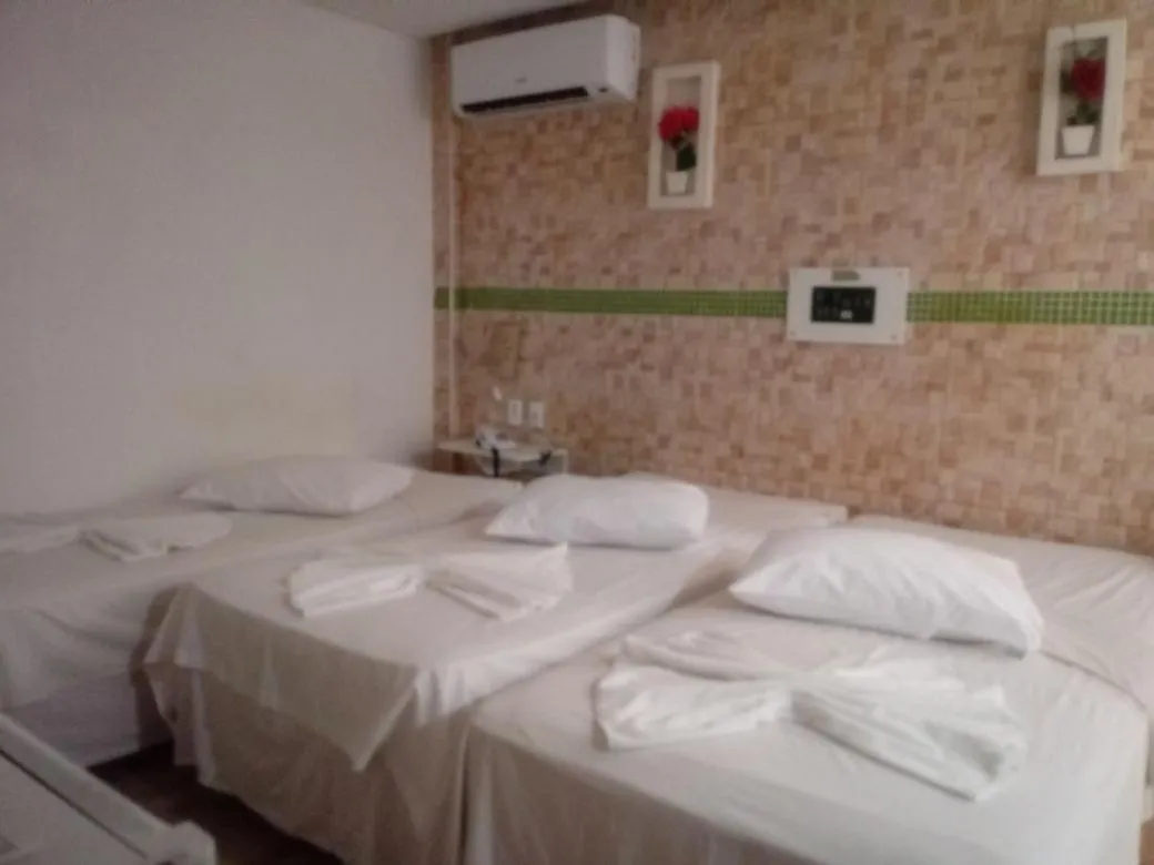 Bed in Hotel Cajuína City