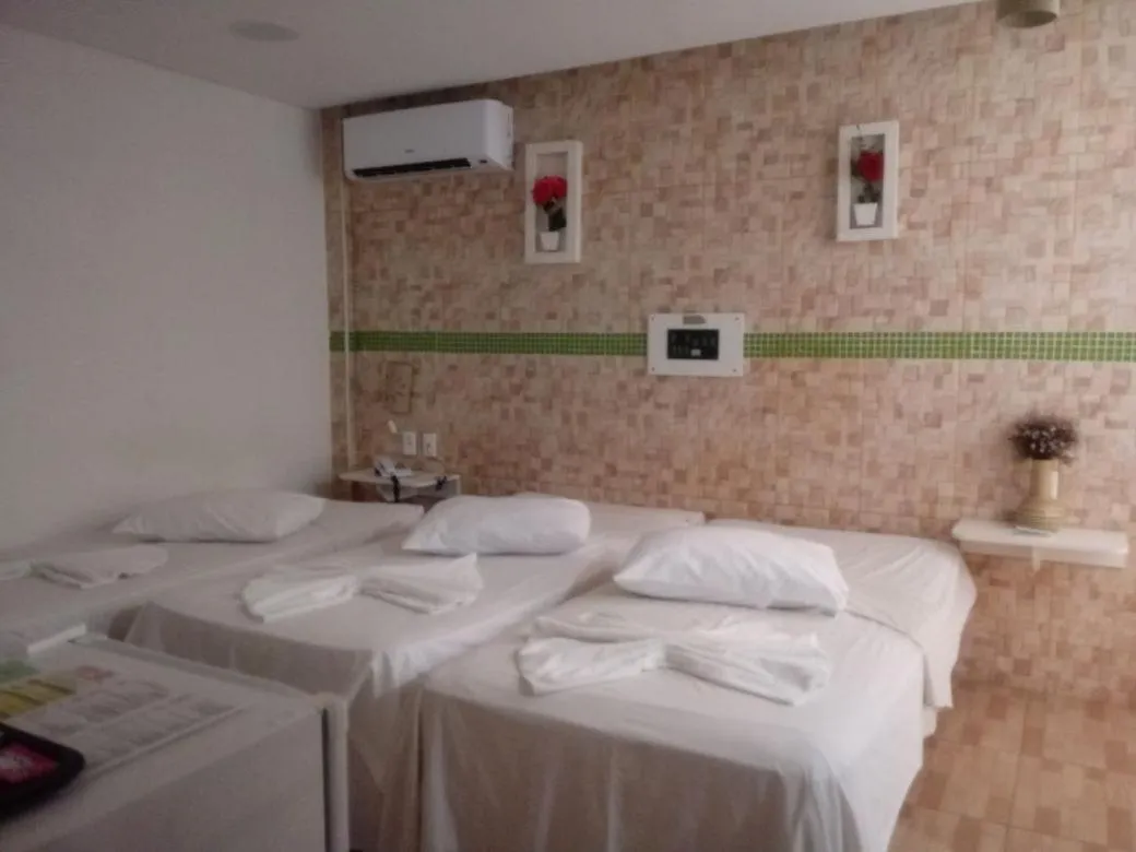 Bed in Hotel Cajuína City