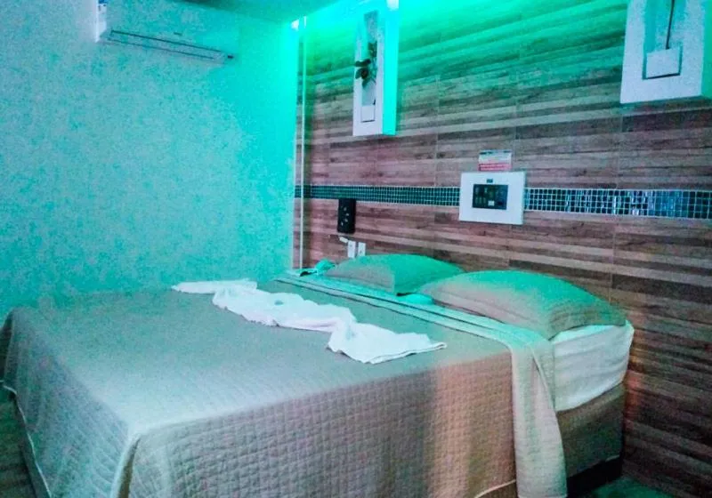 Bed in Hotel Cajuína City