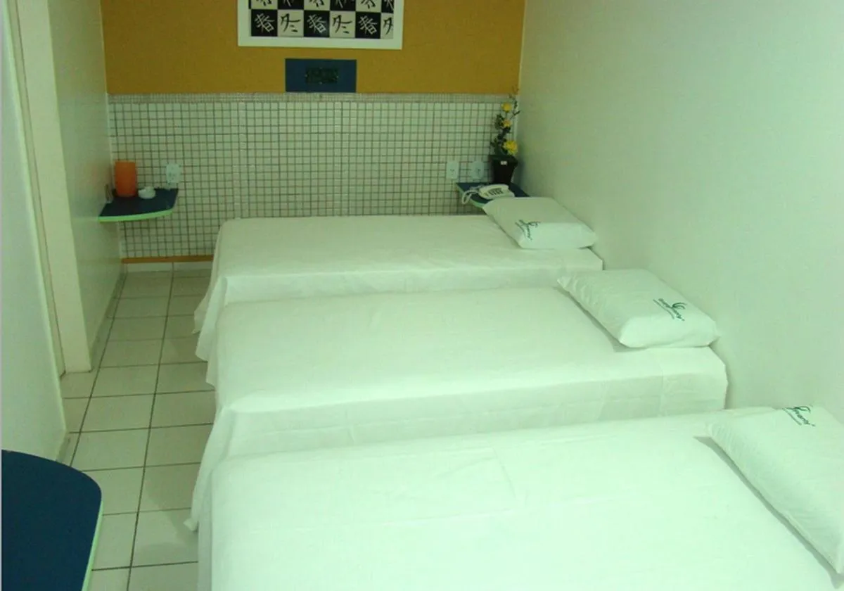 Bed in Hotel Cajuína City