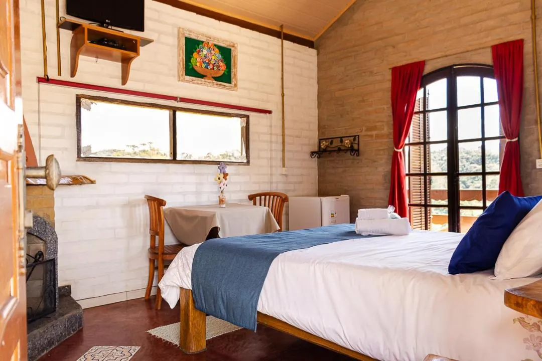 Bed in Pousada Chalés São Francisco