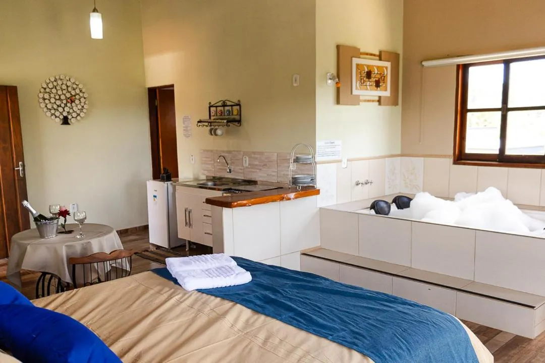 Bed in Pousada Chalés São Francisco