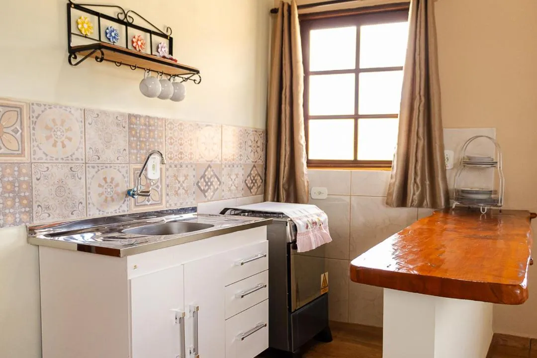 Kitchen or kitchenette in Pousada Chalés São Francisco