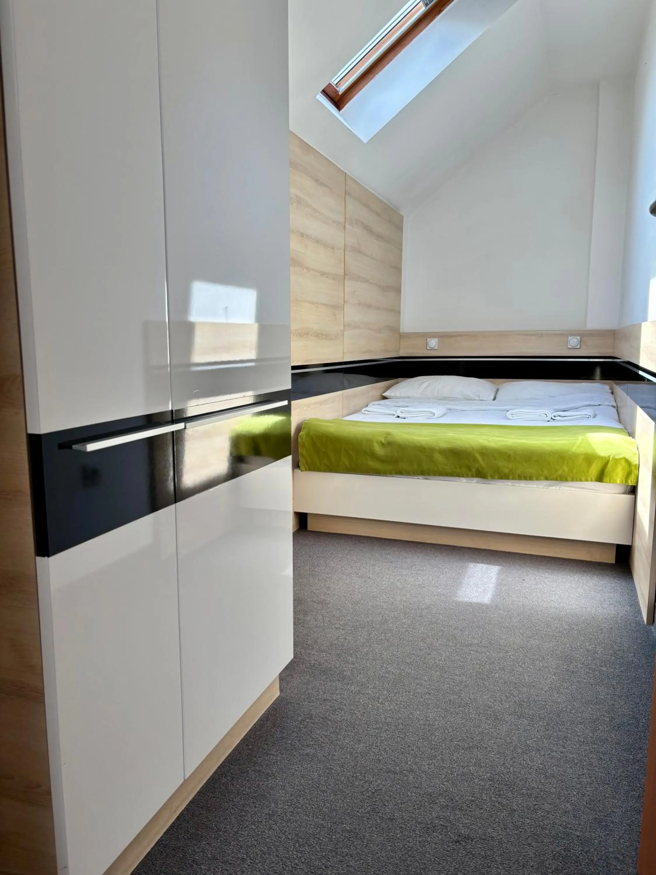 Bed in Garni Hotel Consul