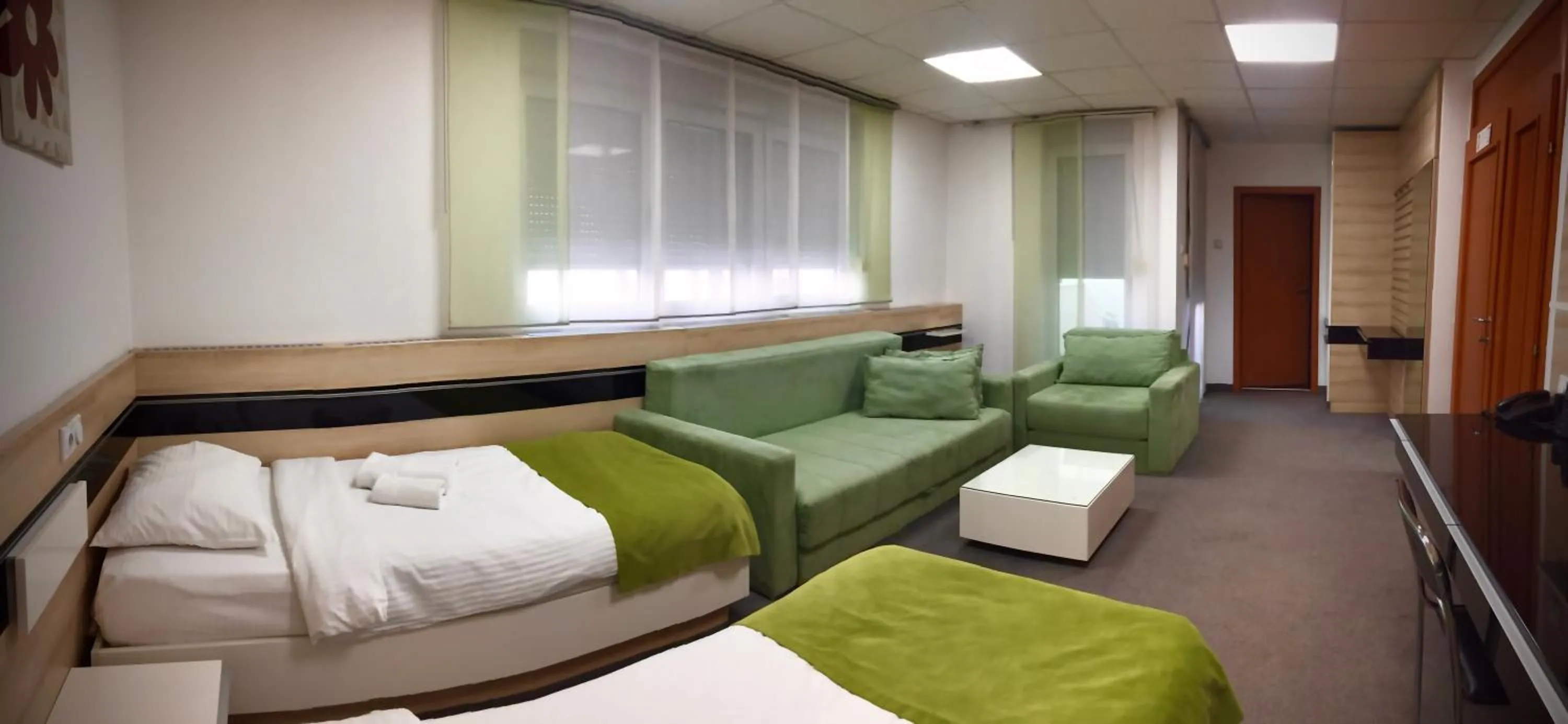 Bed in Garni Hotel Consul