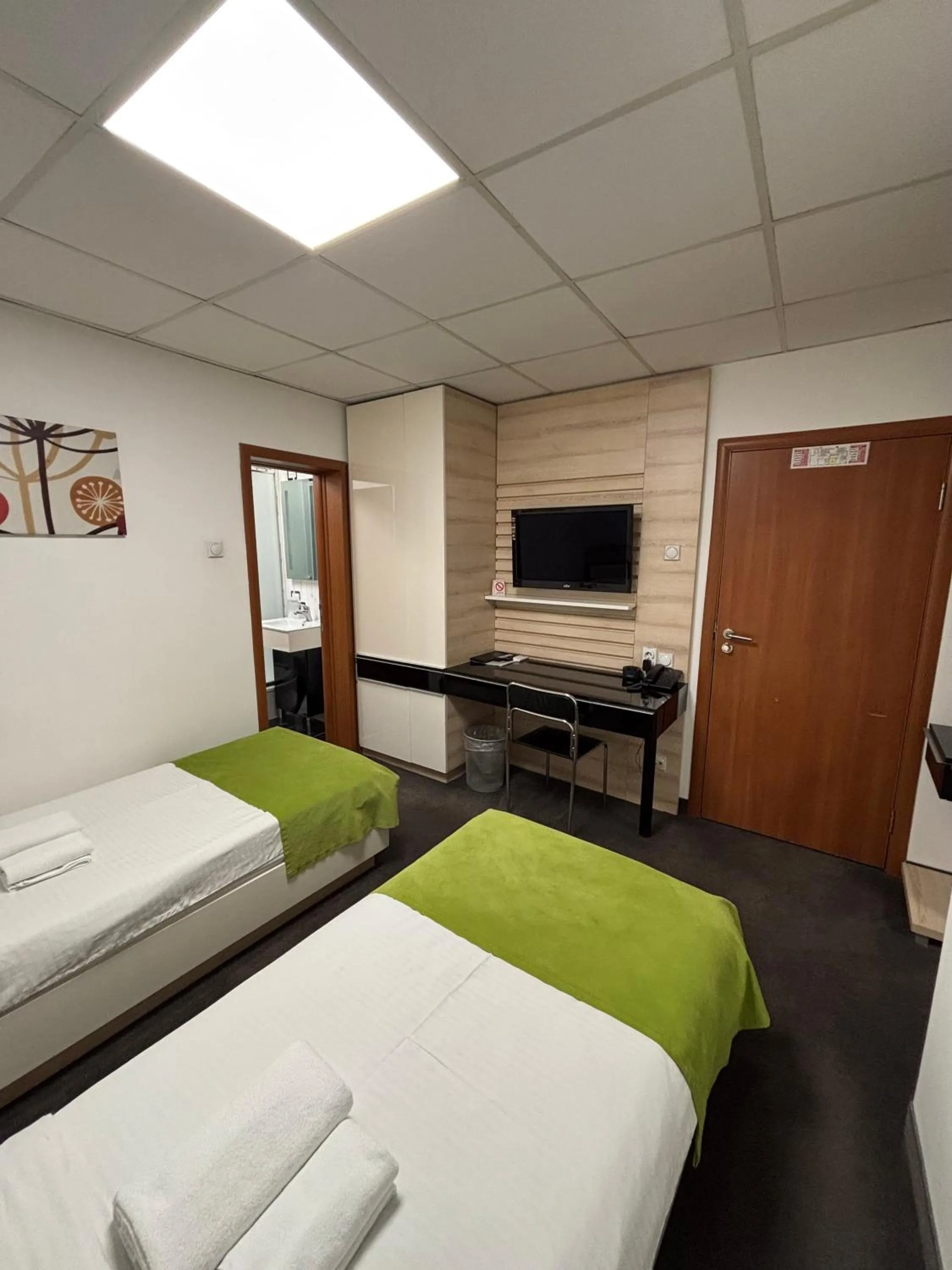 Bed in Garni Hotel Consul