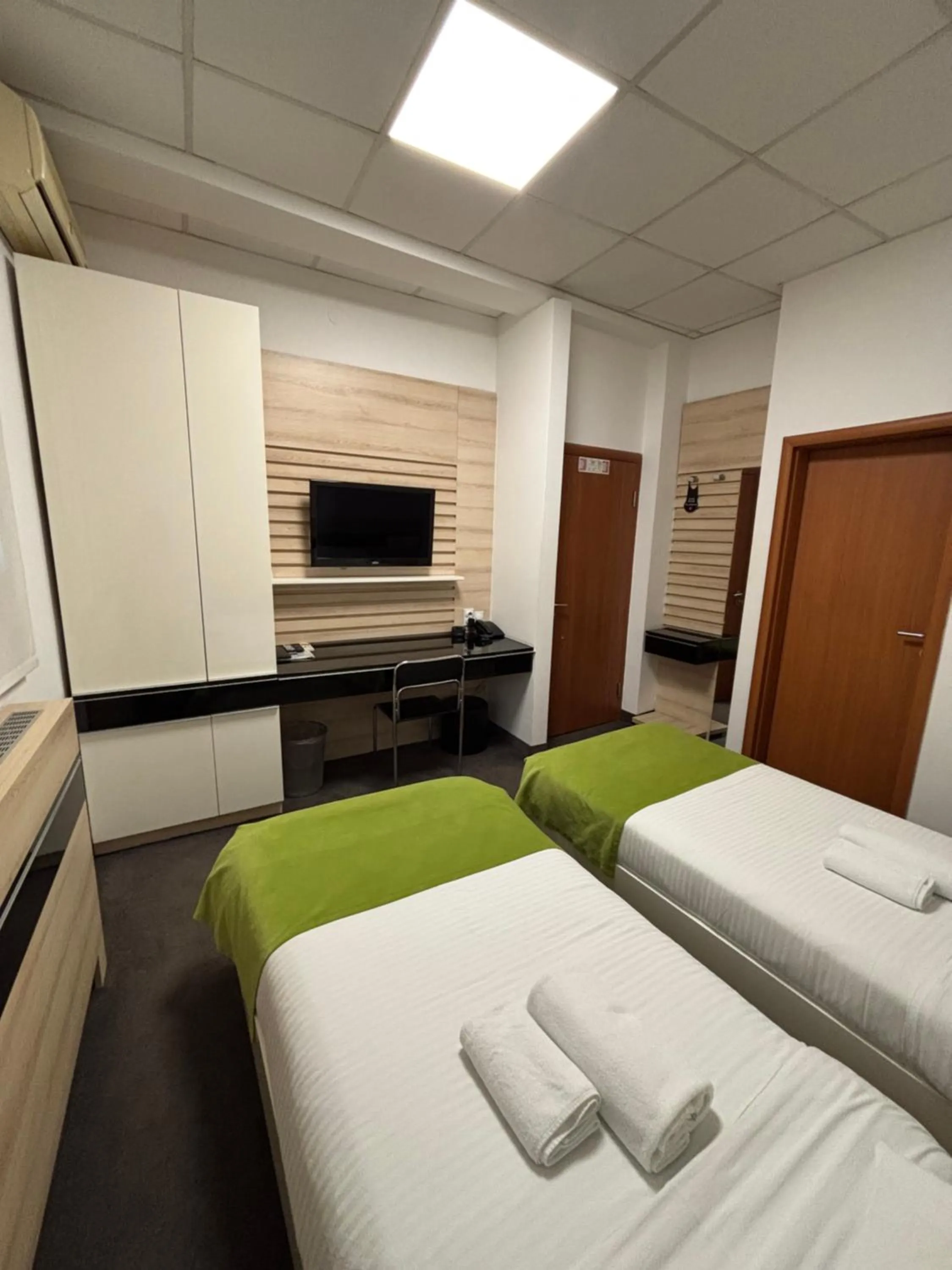 Bed in Garni Hotel Consul