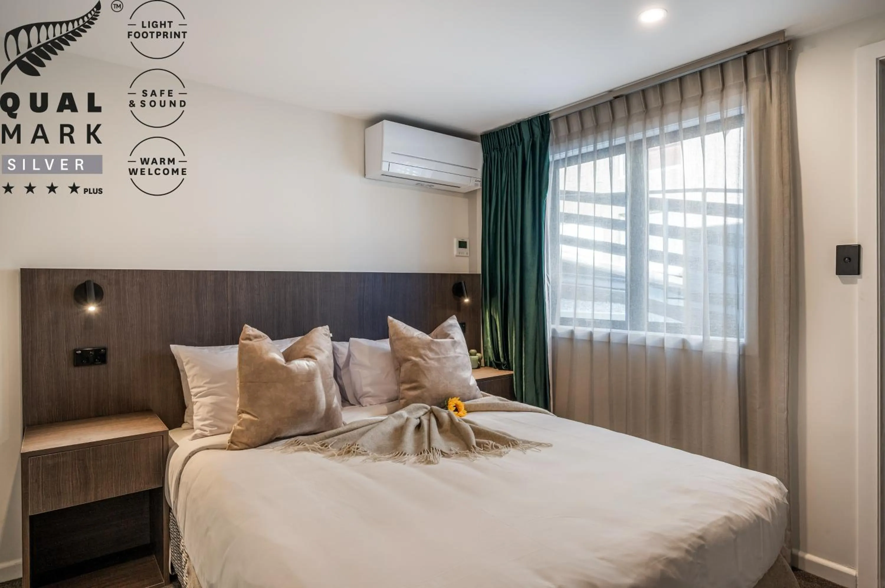 Bed in Luxe Suites & Apartments