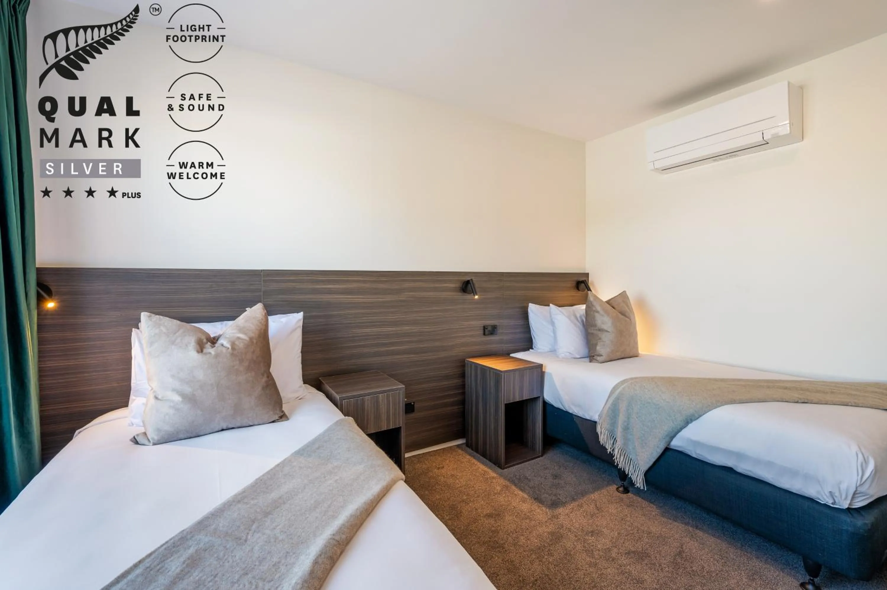 Bed in Luxe Suites & Apartments