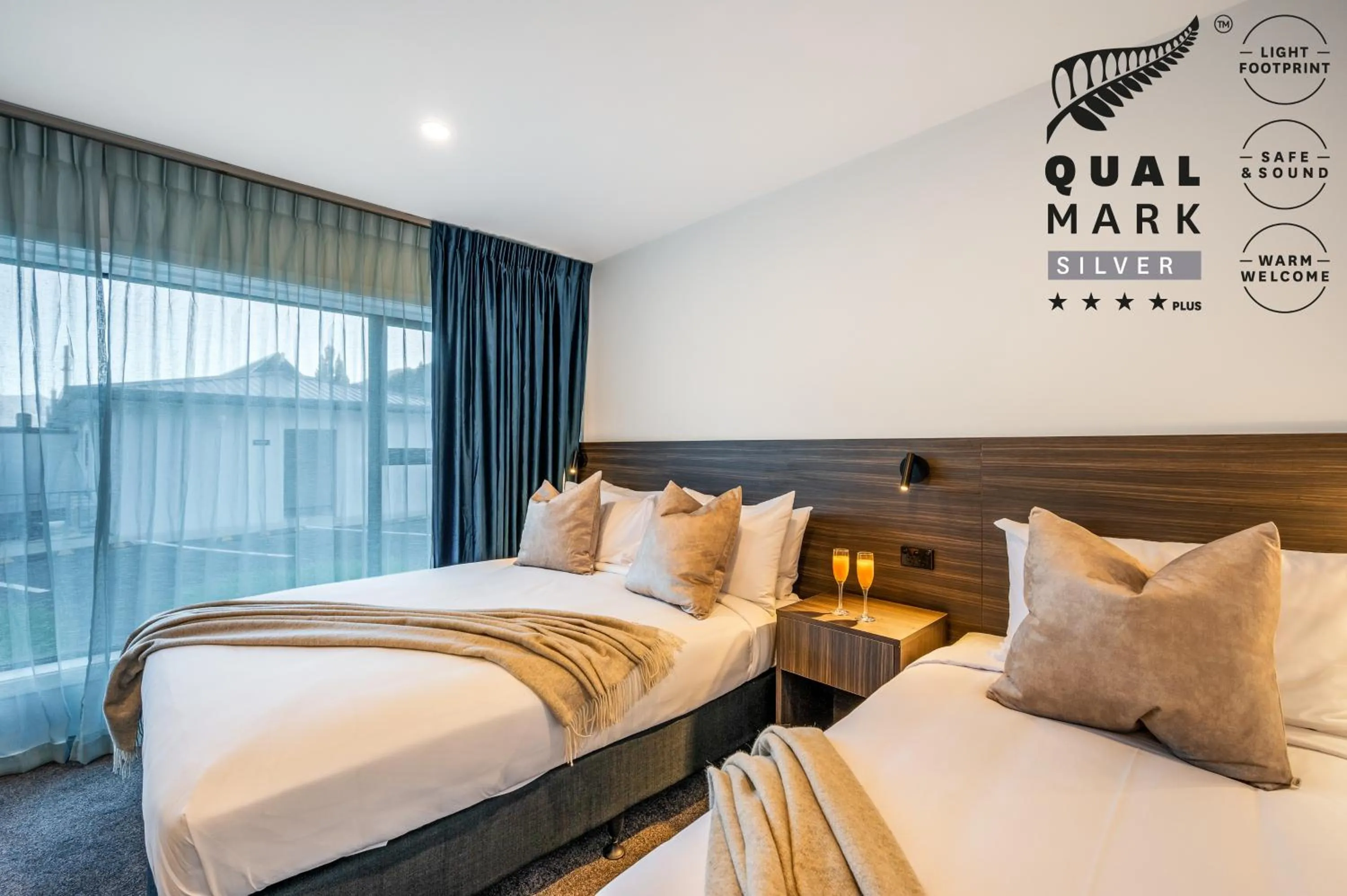 Bed in Luxe Suites & Apartments